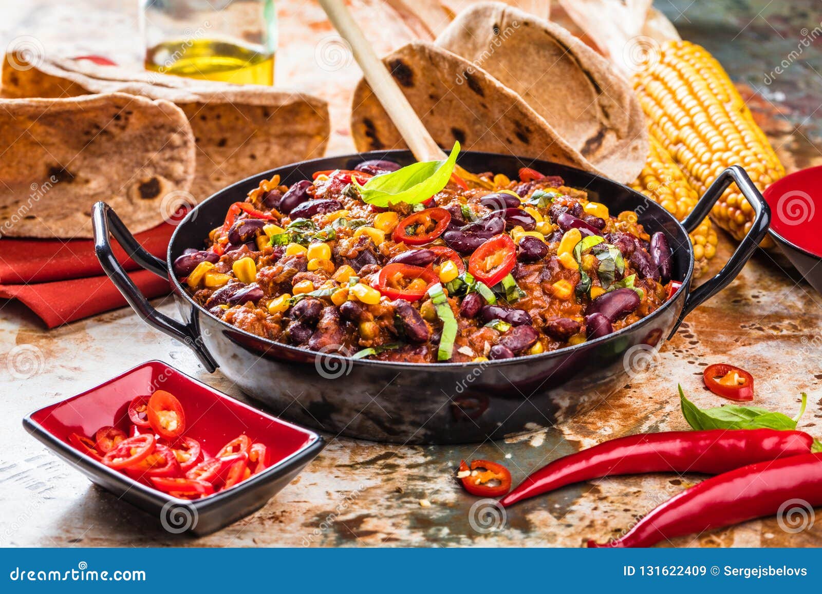 Chili Con Carne in a Clay Bowl on a Concrete or Stone Rustic Background ...