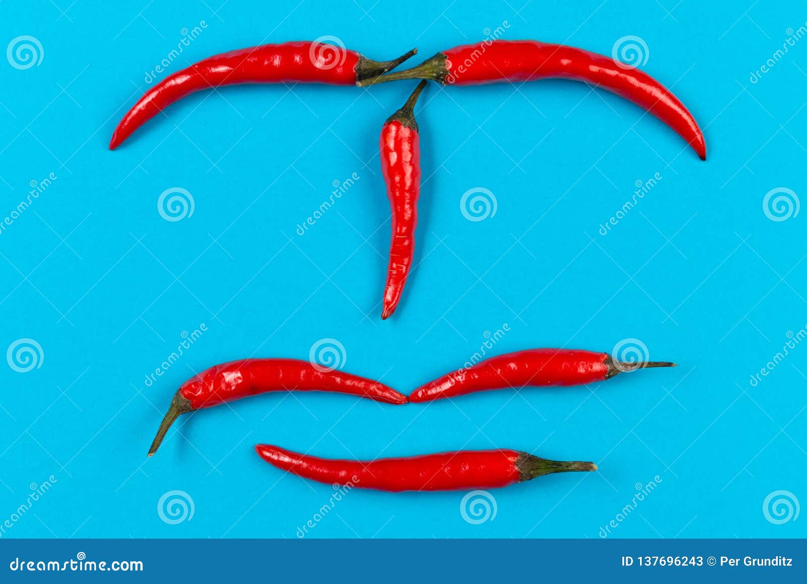Red Chili Pepper Face on Blue Background Stock Image Image of cayenne