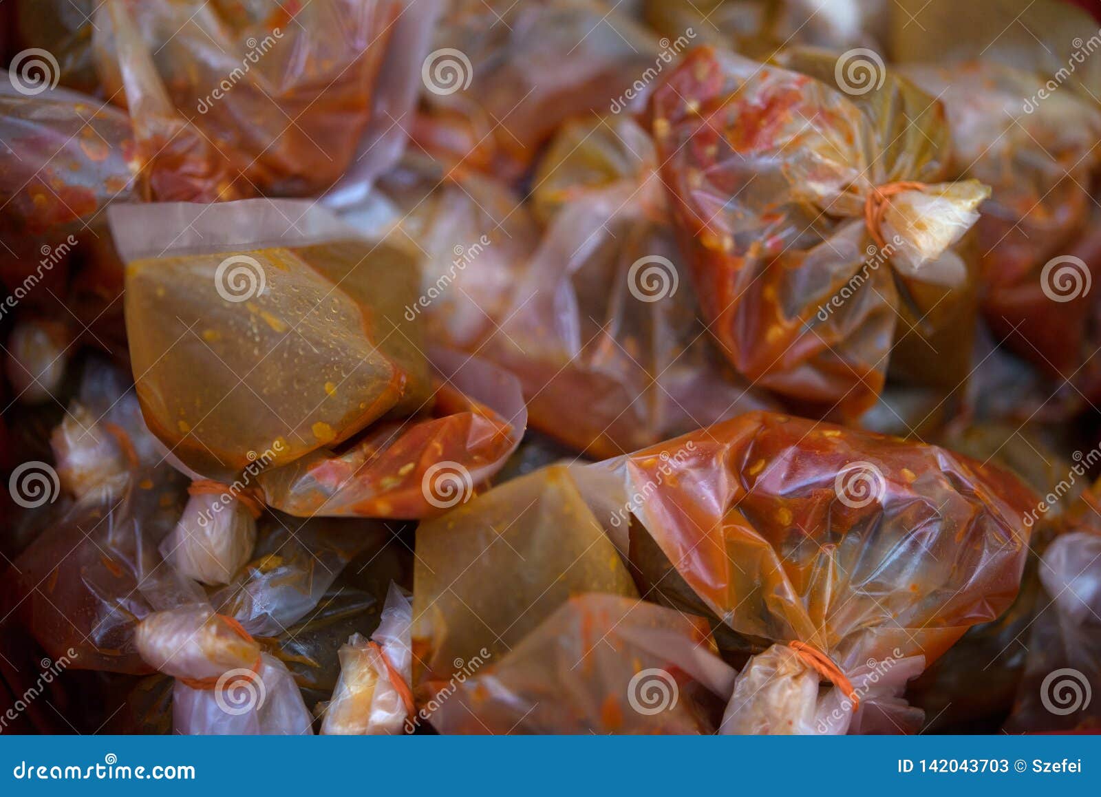 Chili sauce packs stock image. Image of chili, asian 142043703