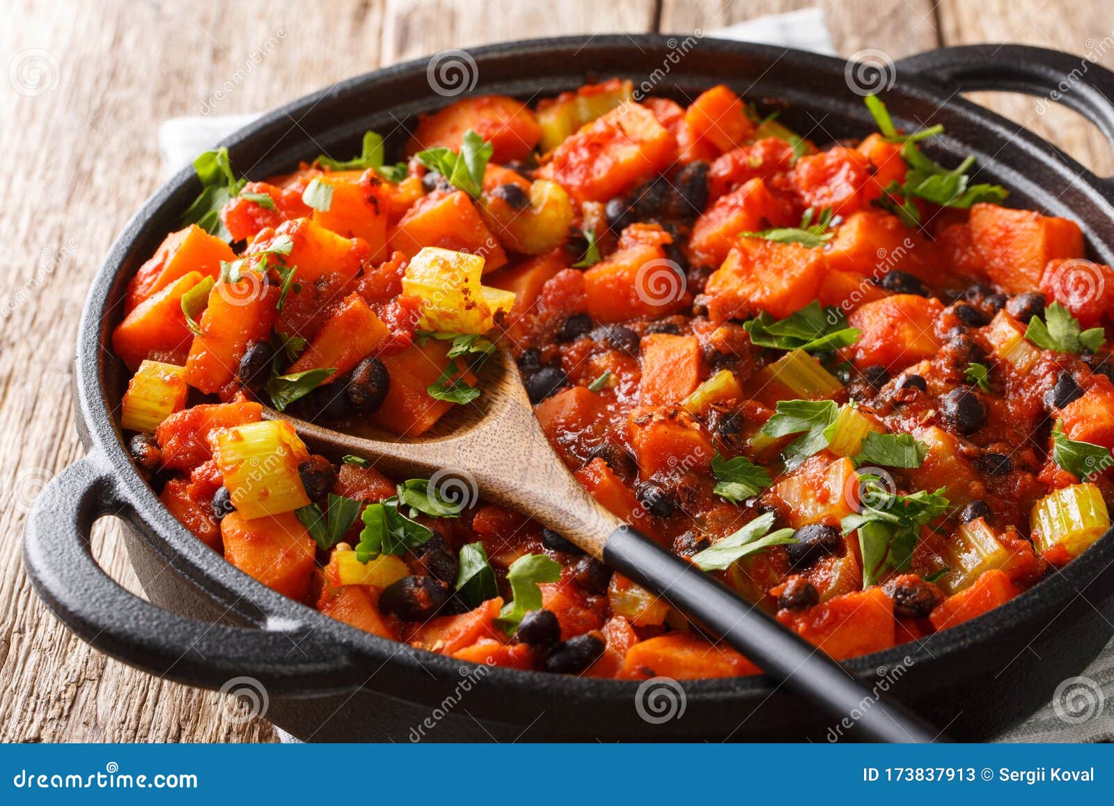 Chili Sweet Potatoes and Black Beans with Tomatoes, Celery Close-up in ...