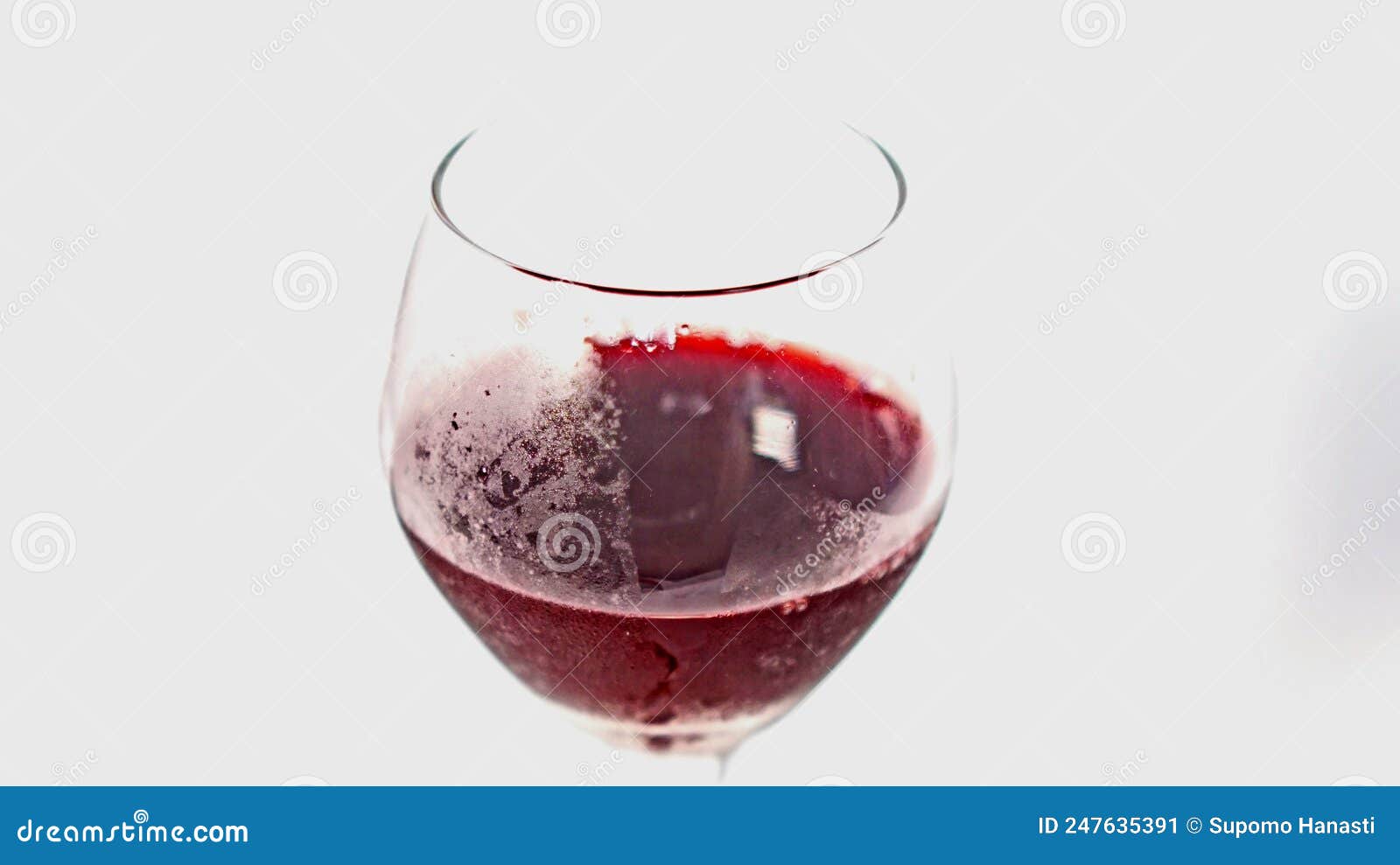 Chill red wine in a glass stock image. Image of celebration 247635391