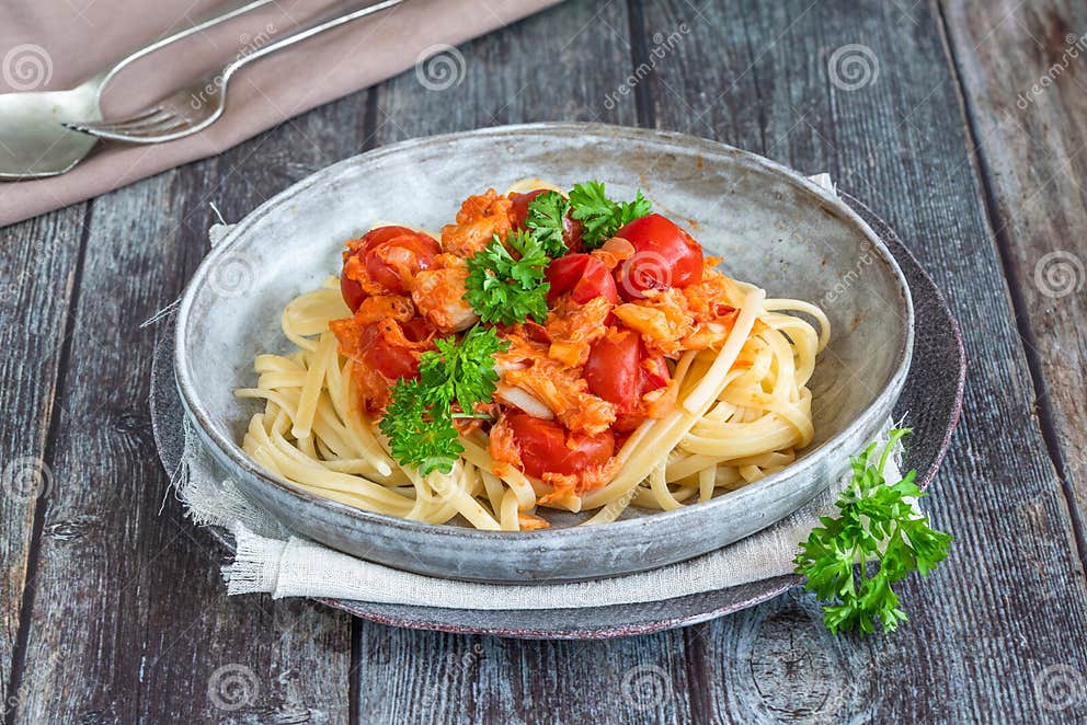 Chilli Crab and Cherry Tomato Linguine Stock Photo - Image of cooked