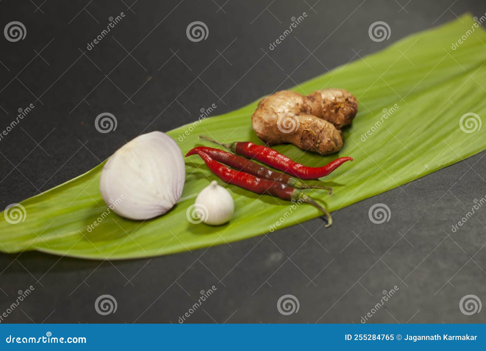 Chilli Onion Garlic Ginger is Placed on a Turmeric Leaf Stock Image