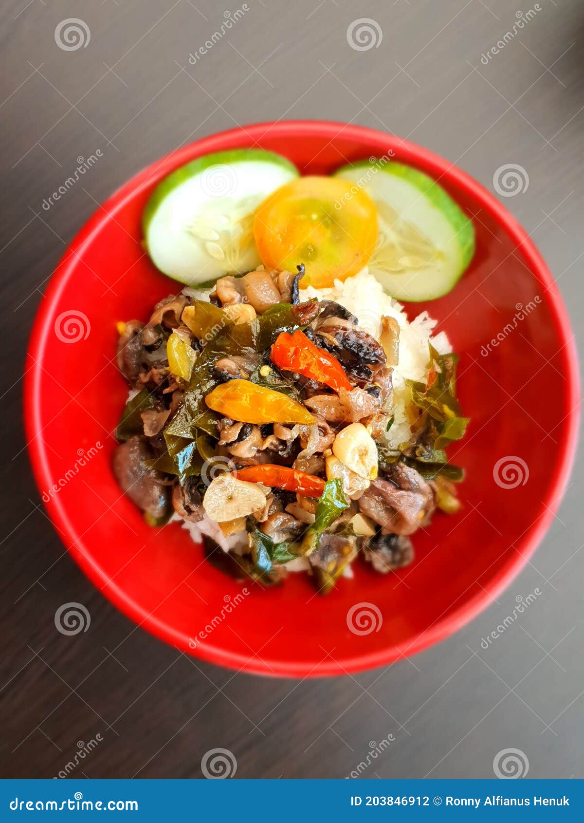 Chilli squid rice bowl stock photo. Image of breakfast 203846912