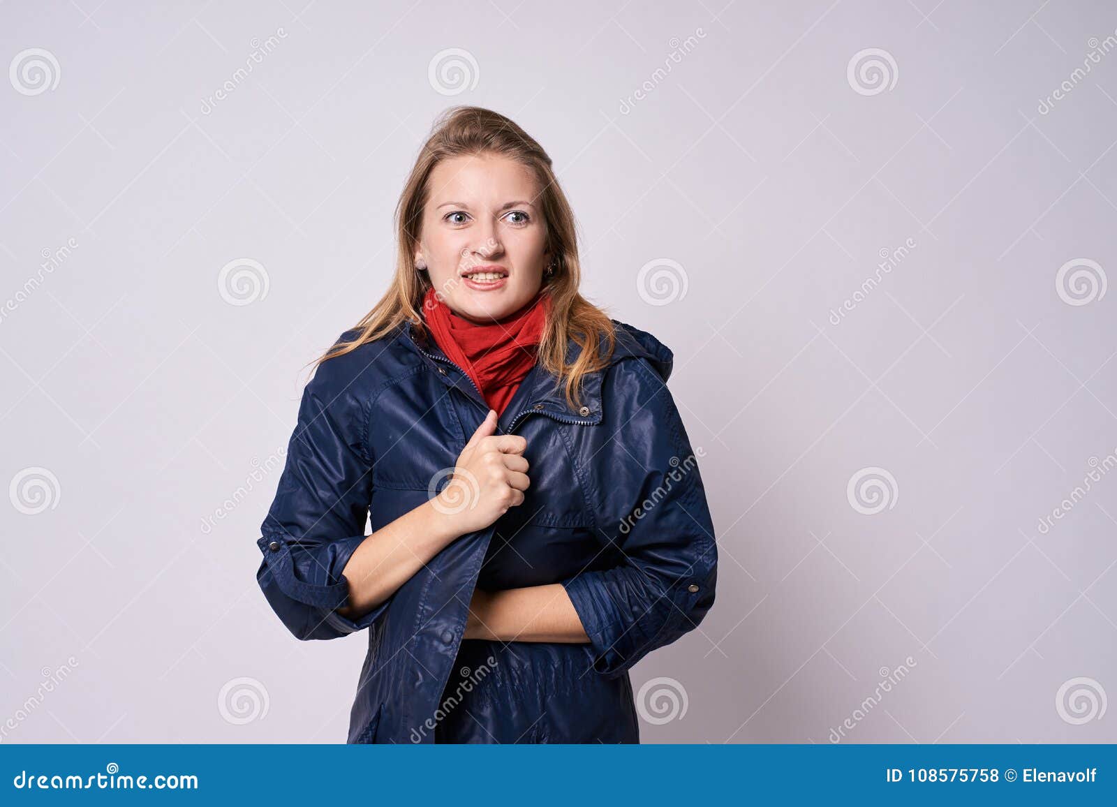 chills. warm clothes. young girl. white background