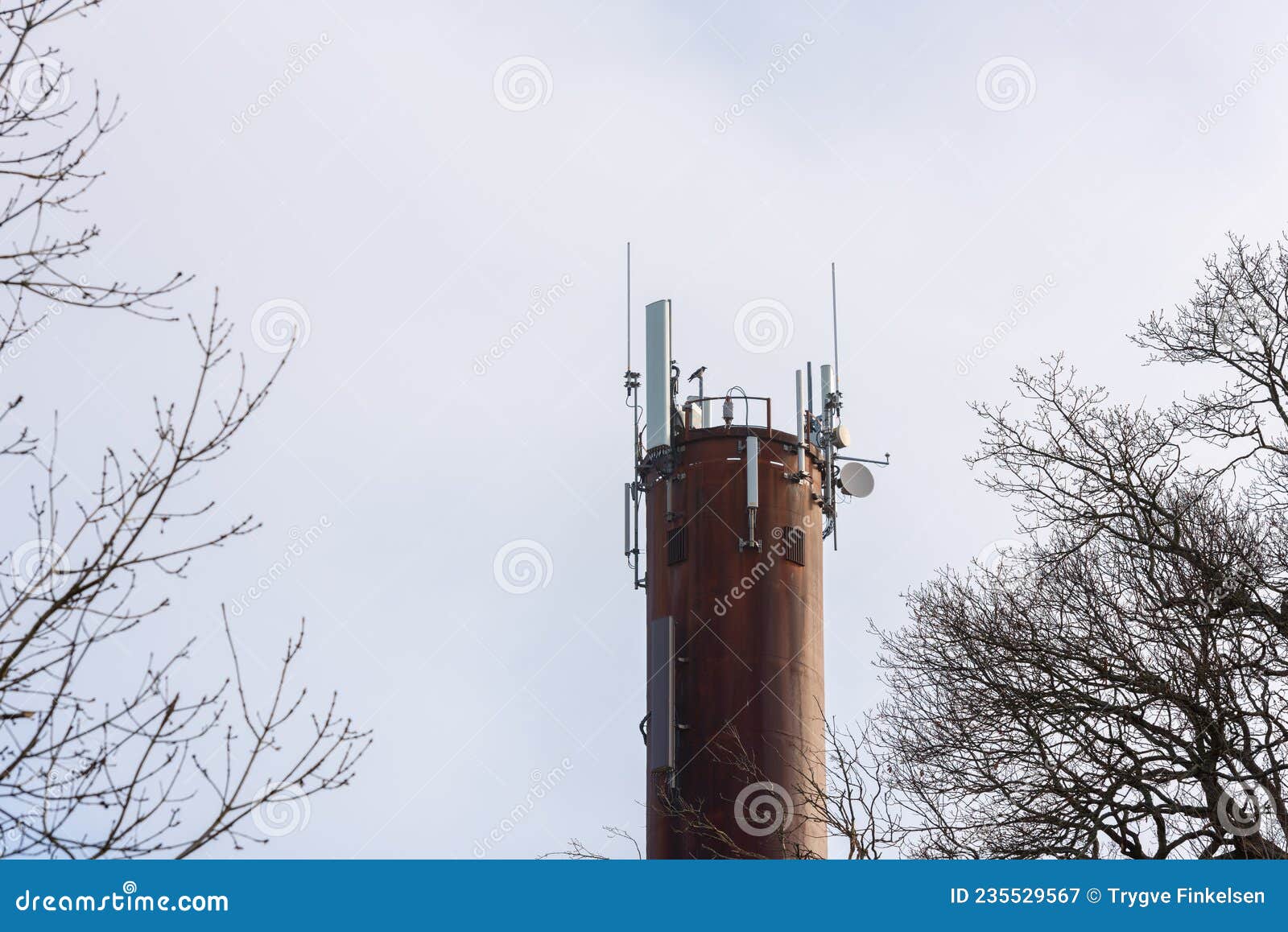 Chimney with an Assortment of Different Antennas and Transmitters Stock