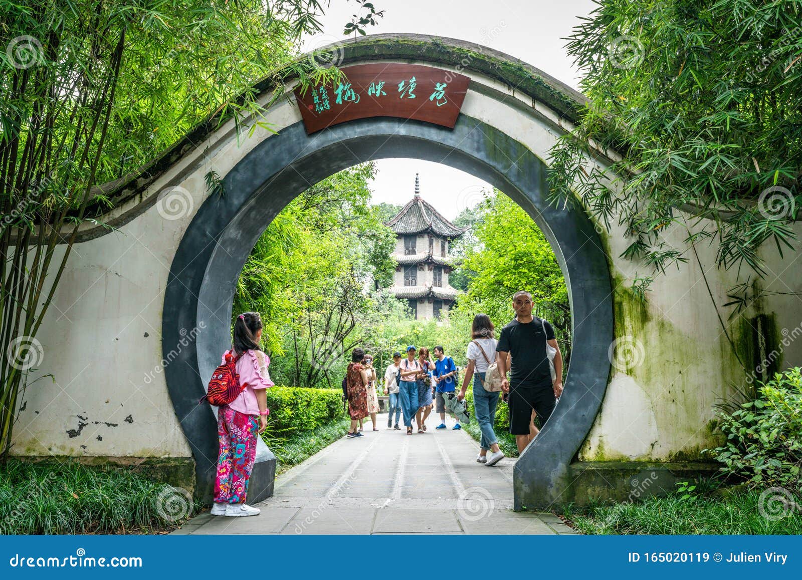 Chinese Arch Gate And Chinese Tourists At Du Fu Thatched Cottage