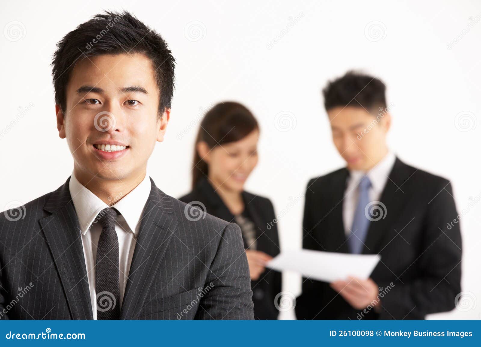 Chinese Businesspeople Discussing Document Stock Photo Image of asia