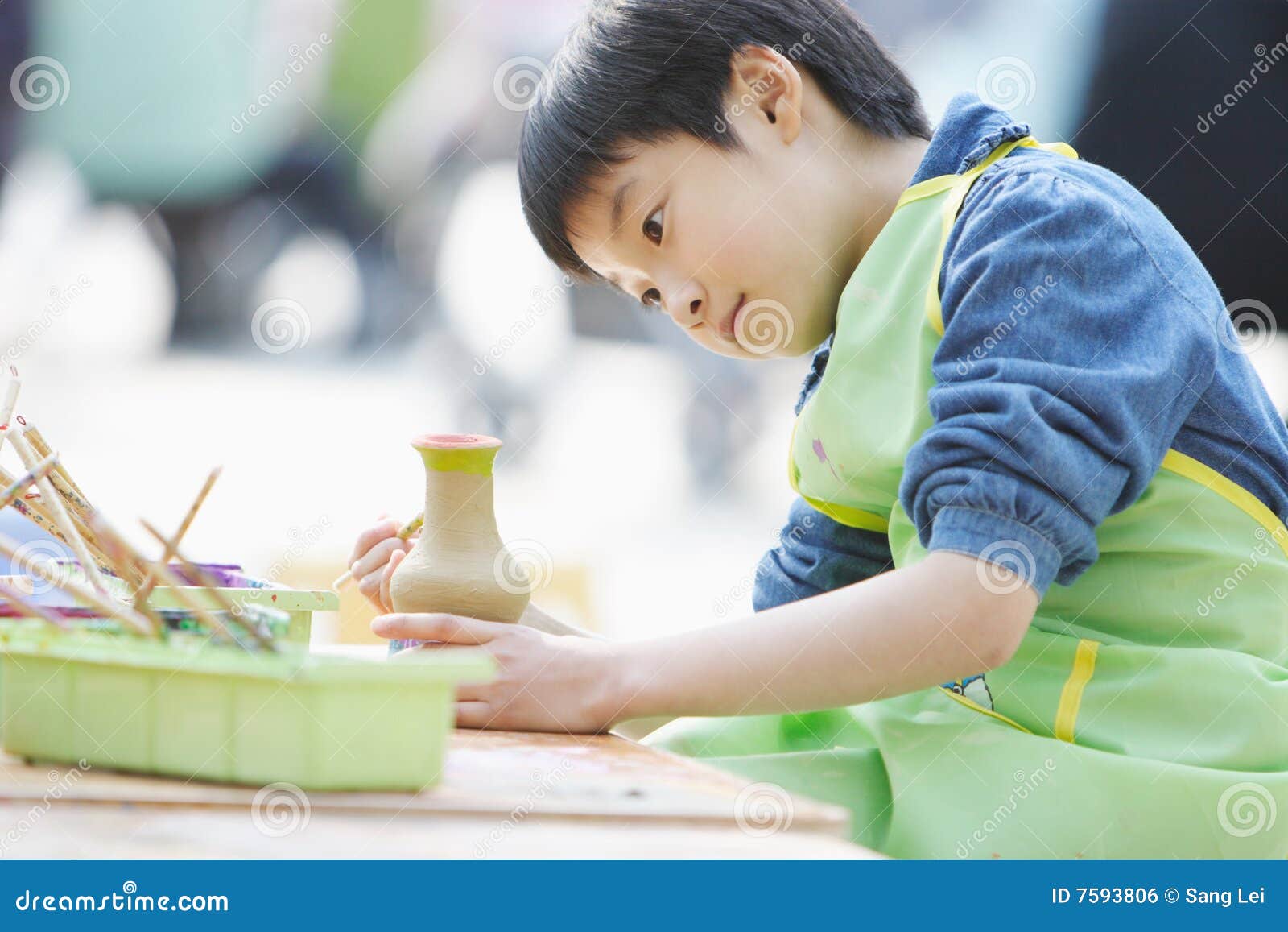 chinese child dedicated makes handwork