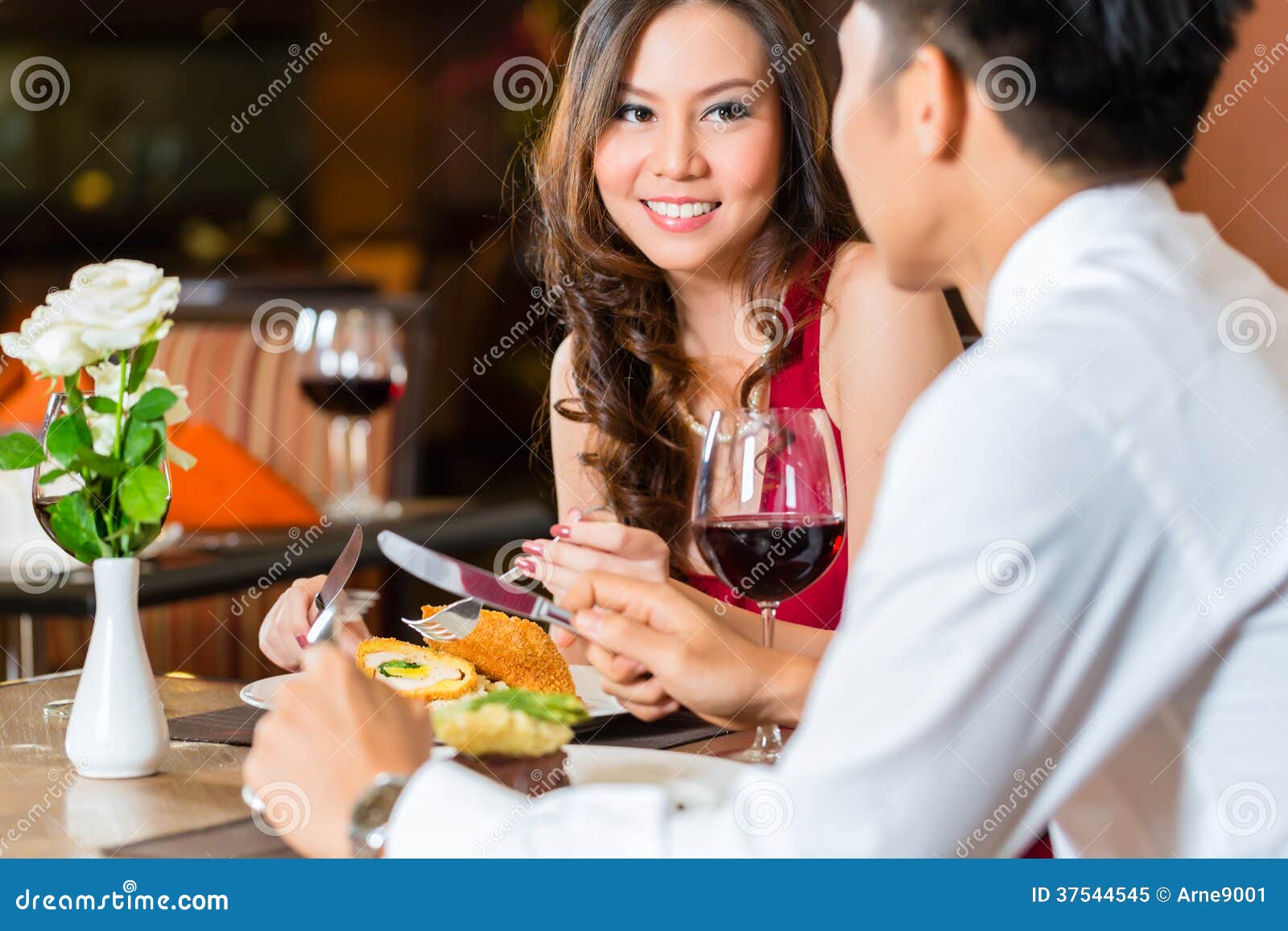 Chinese Couple Having Romantic Dinner In Fancy Restaurant Stock Image Image Of Rendezvous