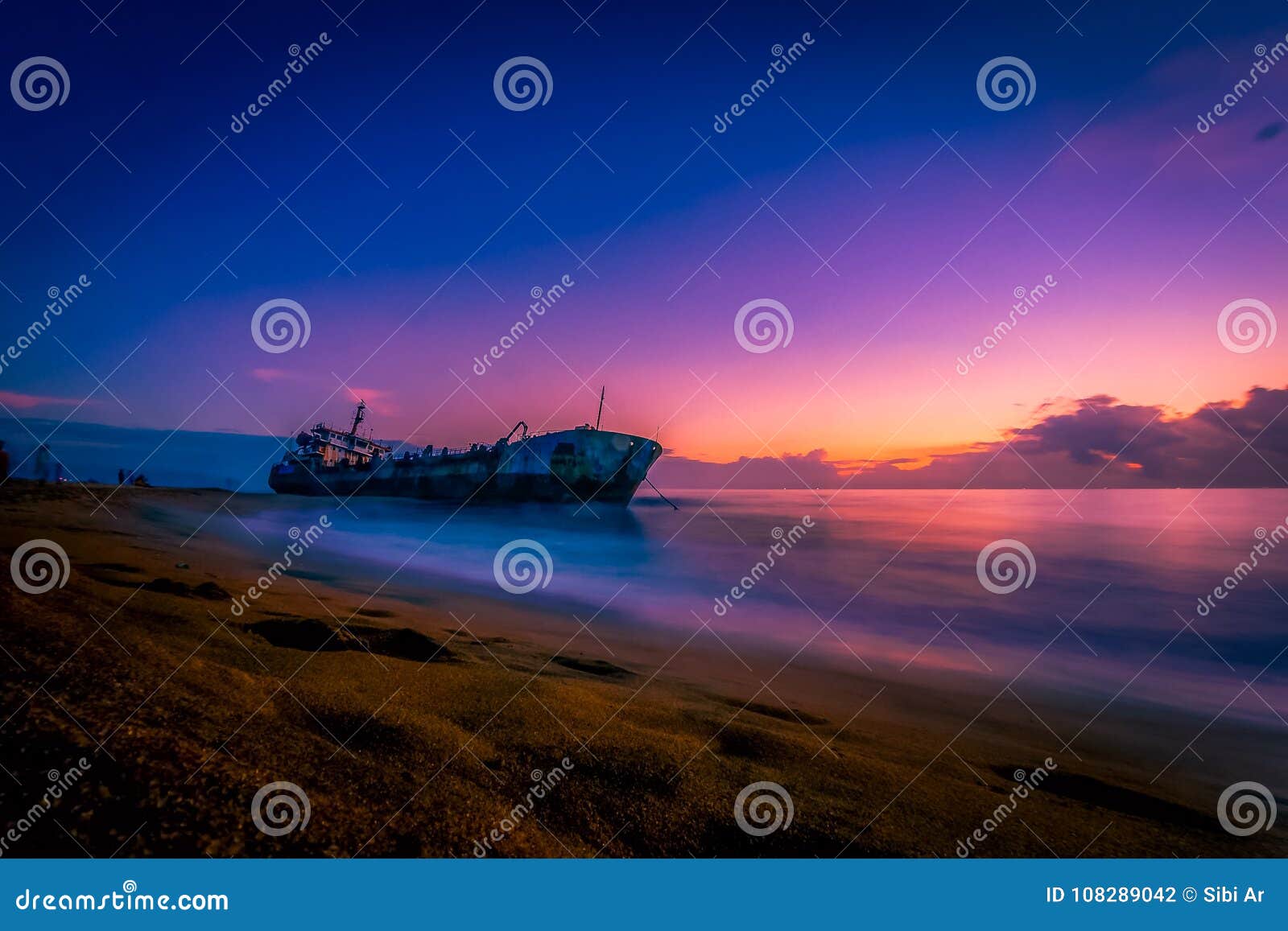 sand trapped ship in kollam beach