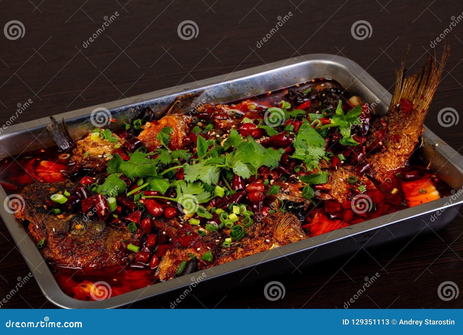 Chinese fried catfish stock image. Image of black, curry 129351113