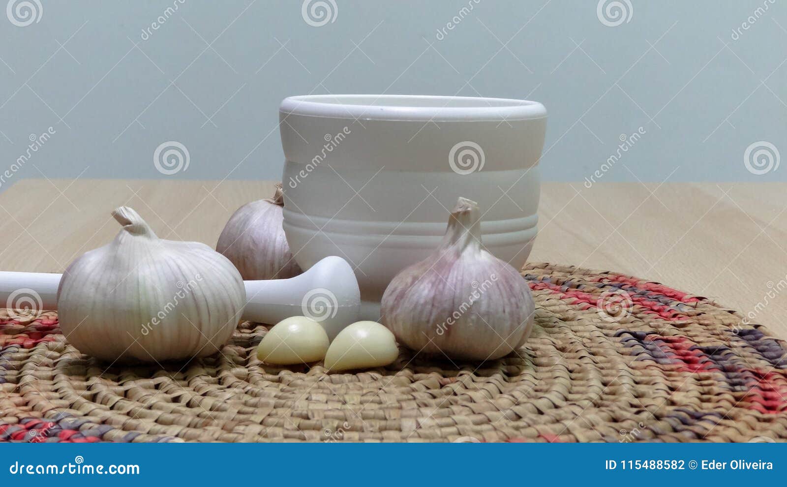Garlic and a garlic punch. stock photo. Image of wood 115488582