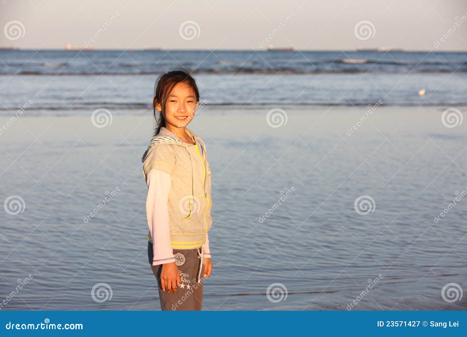 Chinese girl on the beach stock image. Image of little - 23571427