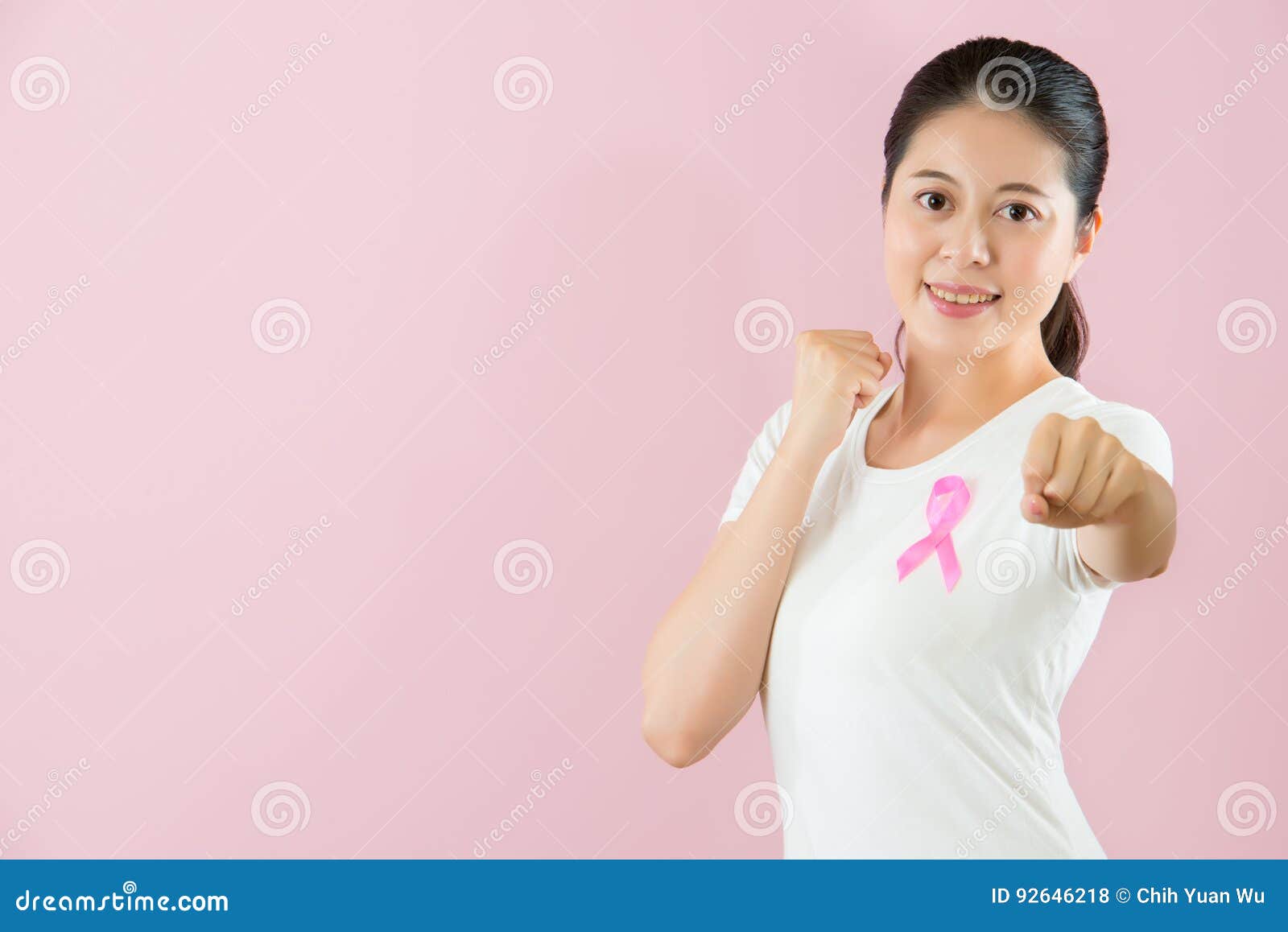 chinese girl make a fist elongation her arms