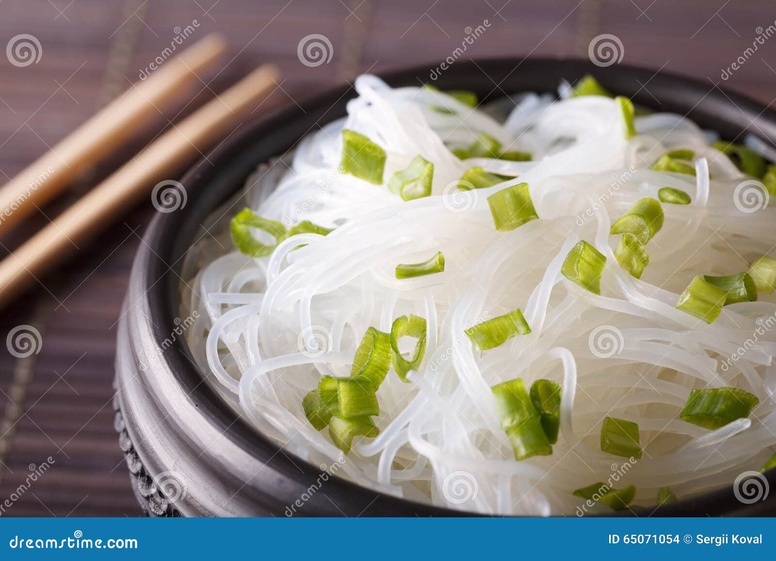 Chinese Glass Noodles in a Bowl Macro on the Table. Horizontal Stock