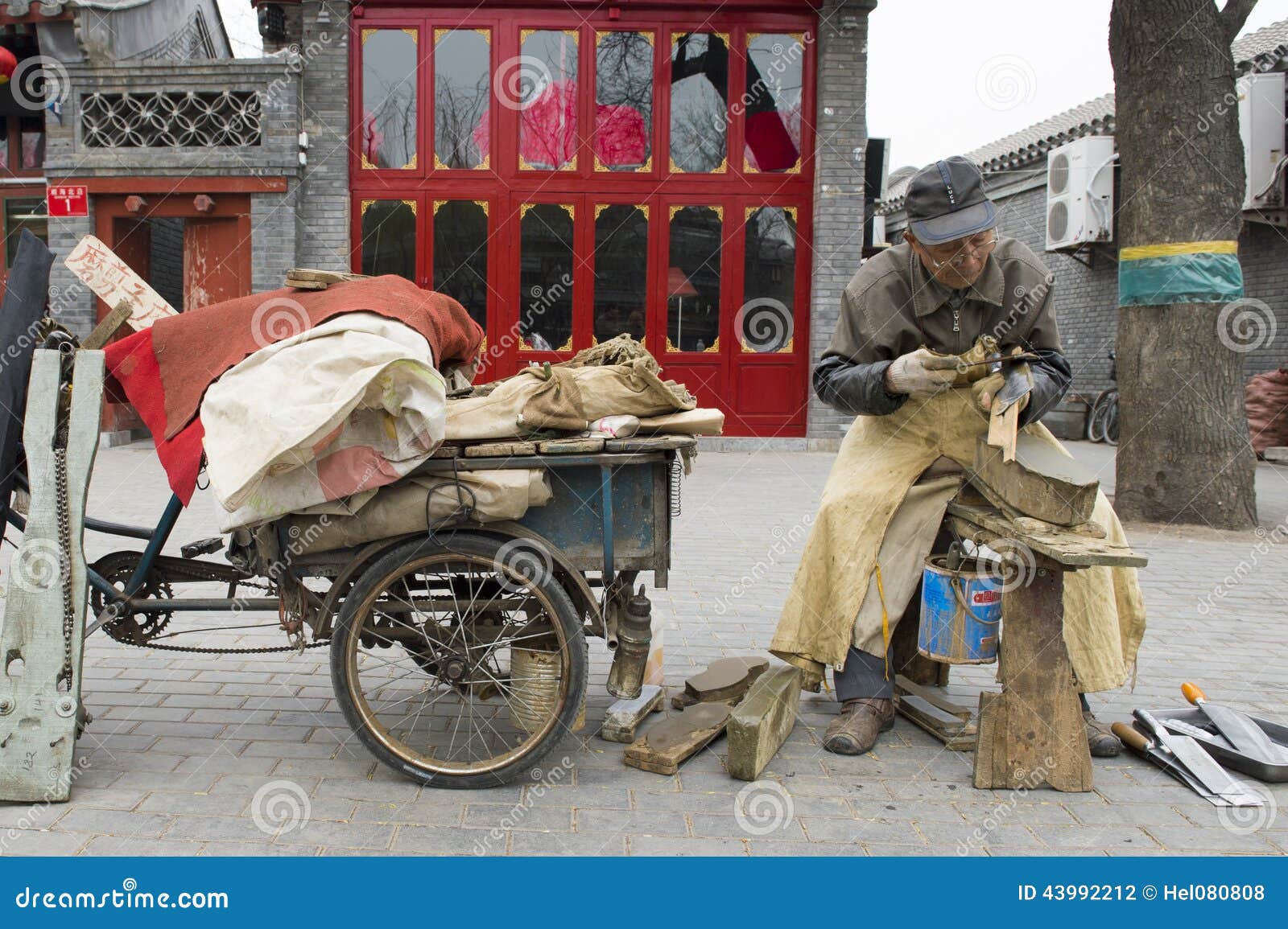Chinese knife sharpener editorial photography. Image of china 43992212