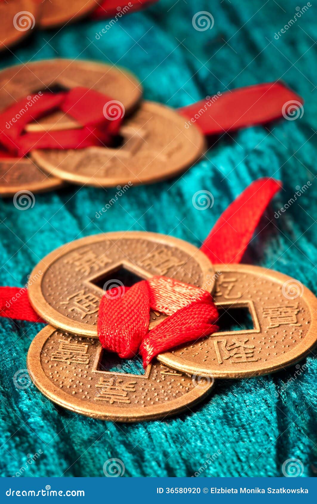 http://thumbs.dreamstime.com/z/chinese-lucky-coins-tied-red-ribbon-36580920.jpg