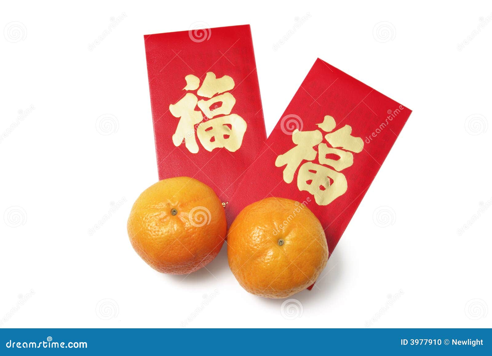 chinese new year red packets and mandarins
