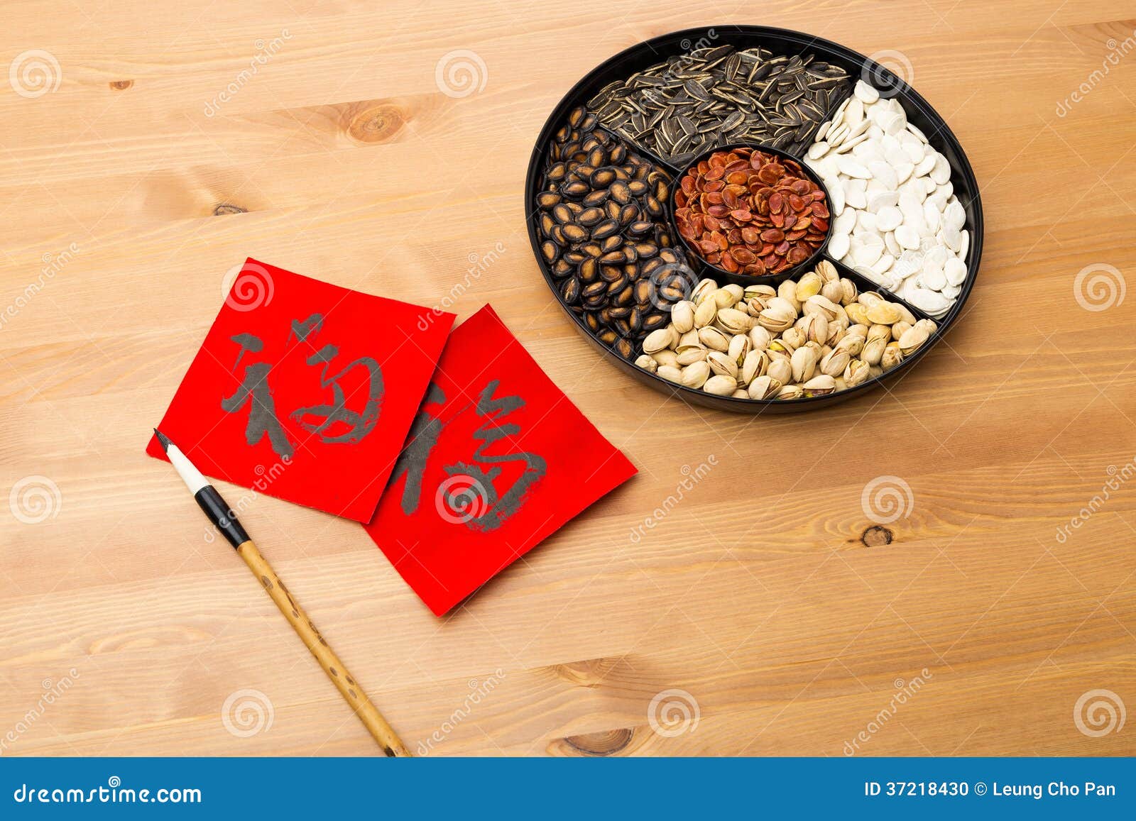 Chinese New Year Snack Tray And Chinese Calligraphy, Meaning For Stock Photo - Image ...