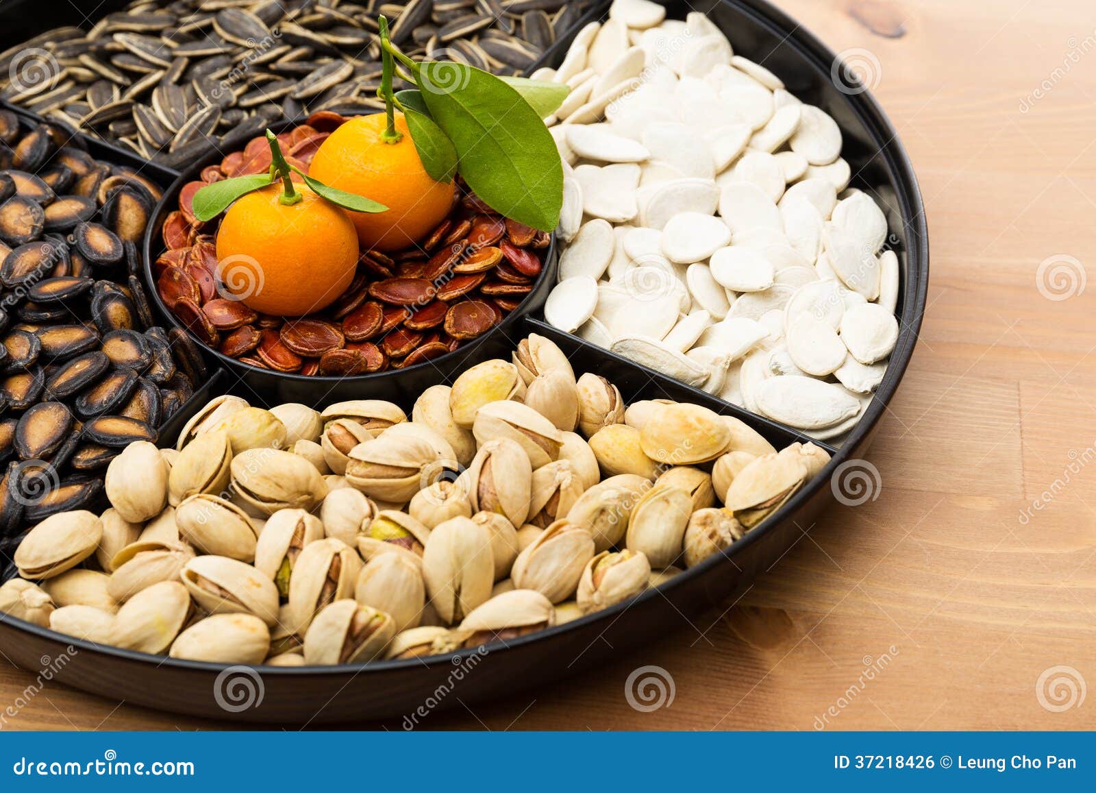 Chinese New Year Snack Tray And Citrus Fruit Stock Photo - Image of baked, kumquat ...