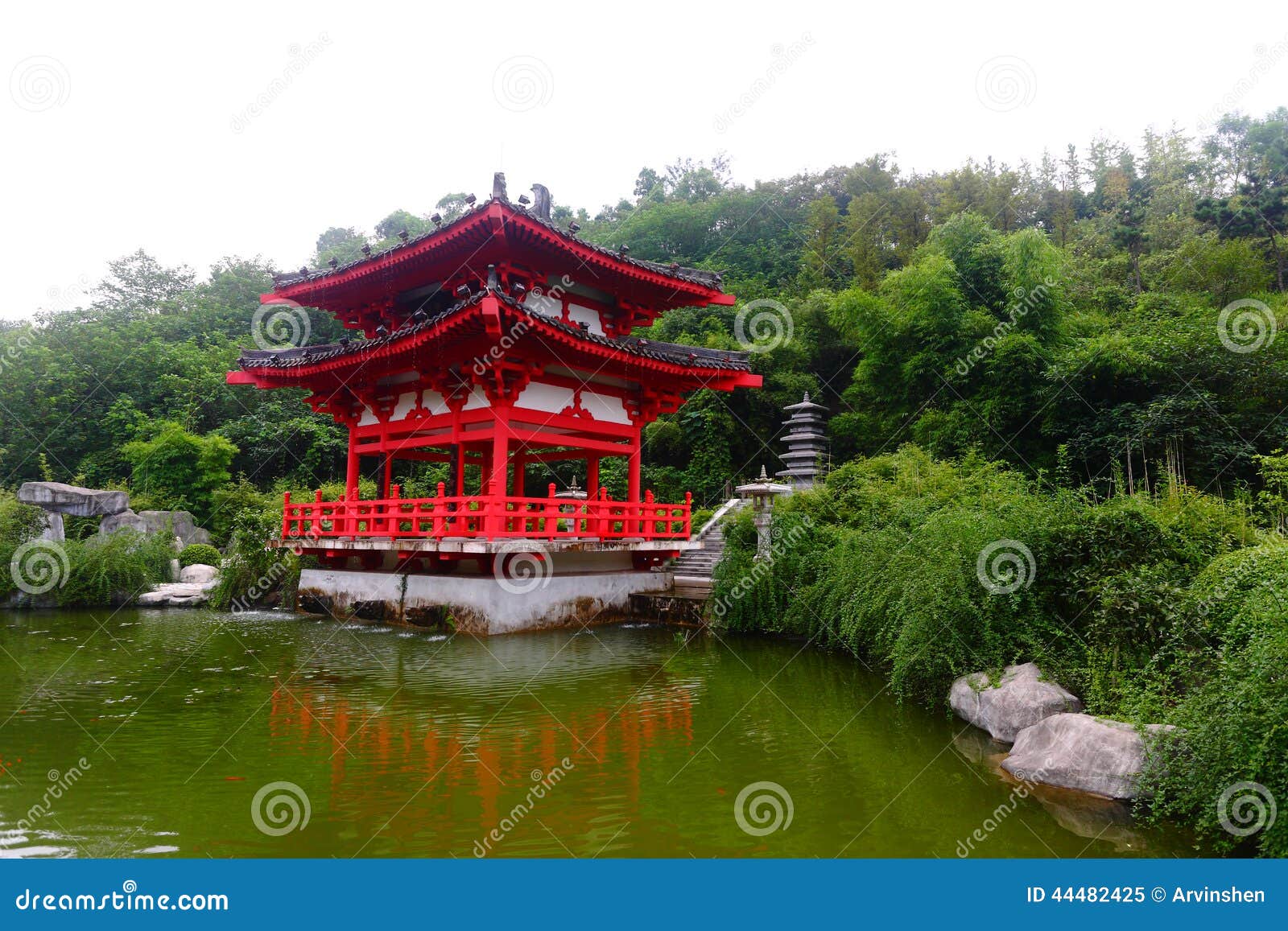 The Chinese Pavilion On The Shoreline Of Stow Lake; A Group Of Canada