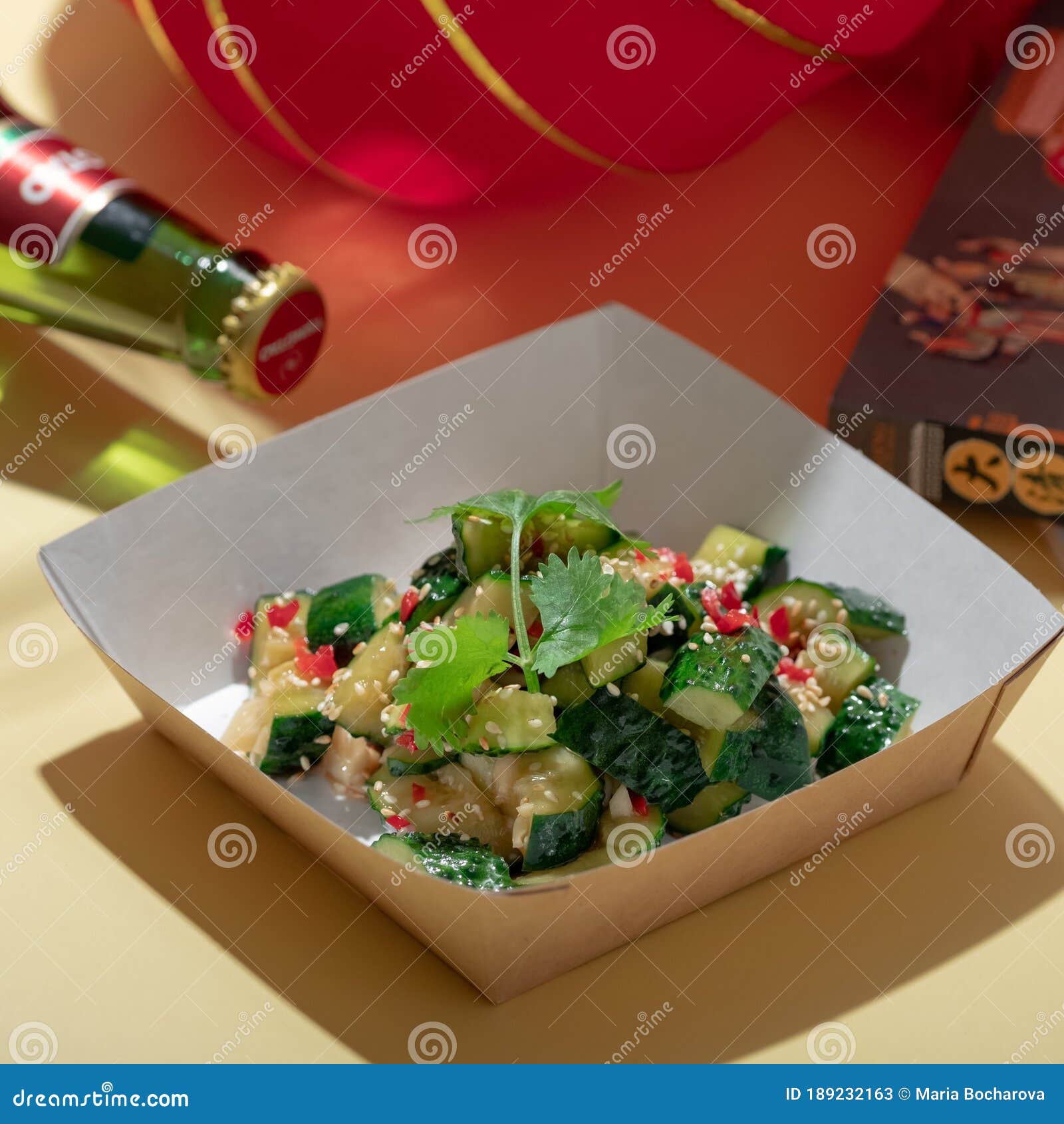 Chinese Salad of Beaten Cucumbers with Garlic, Chili Pepper, Soy Sauce and  Sesame Oil on Yellow Background. Stock Image - Image of japanese, china:  189232163