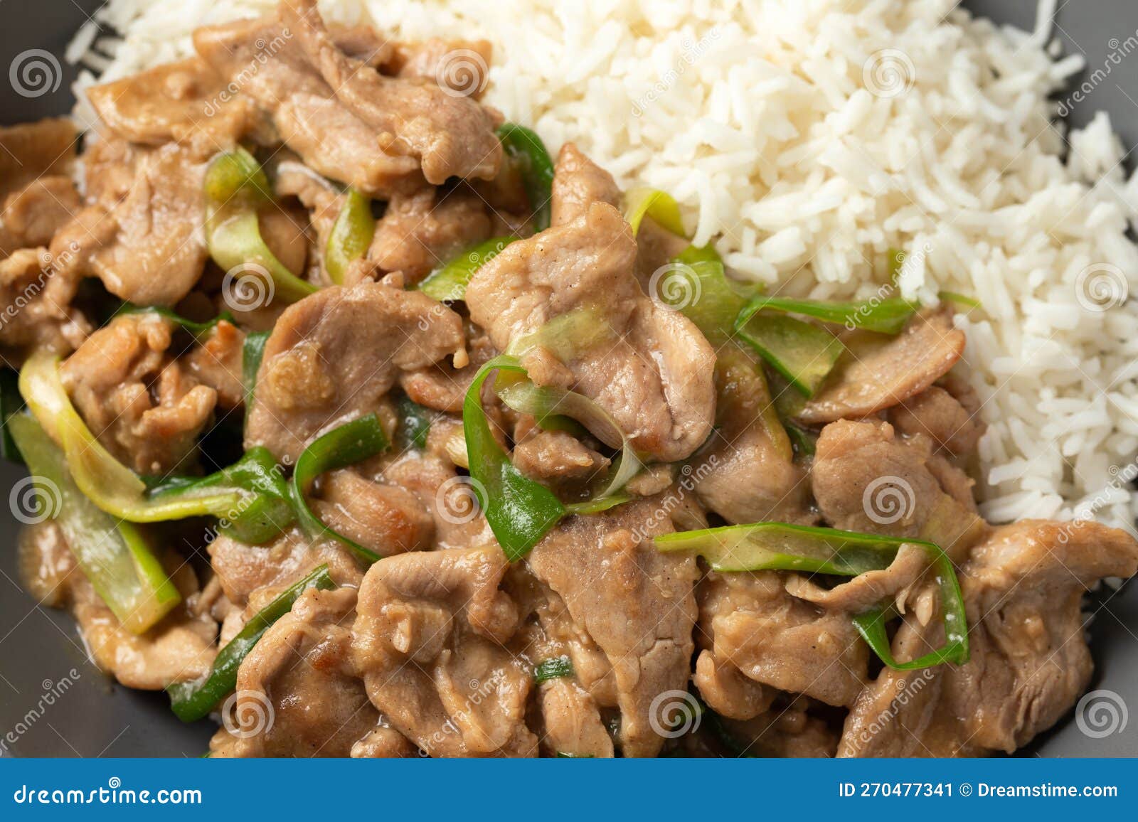 Chinese Stir Fry Pork with Ginger Sauce, Garlic and Spring Onion. Asian