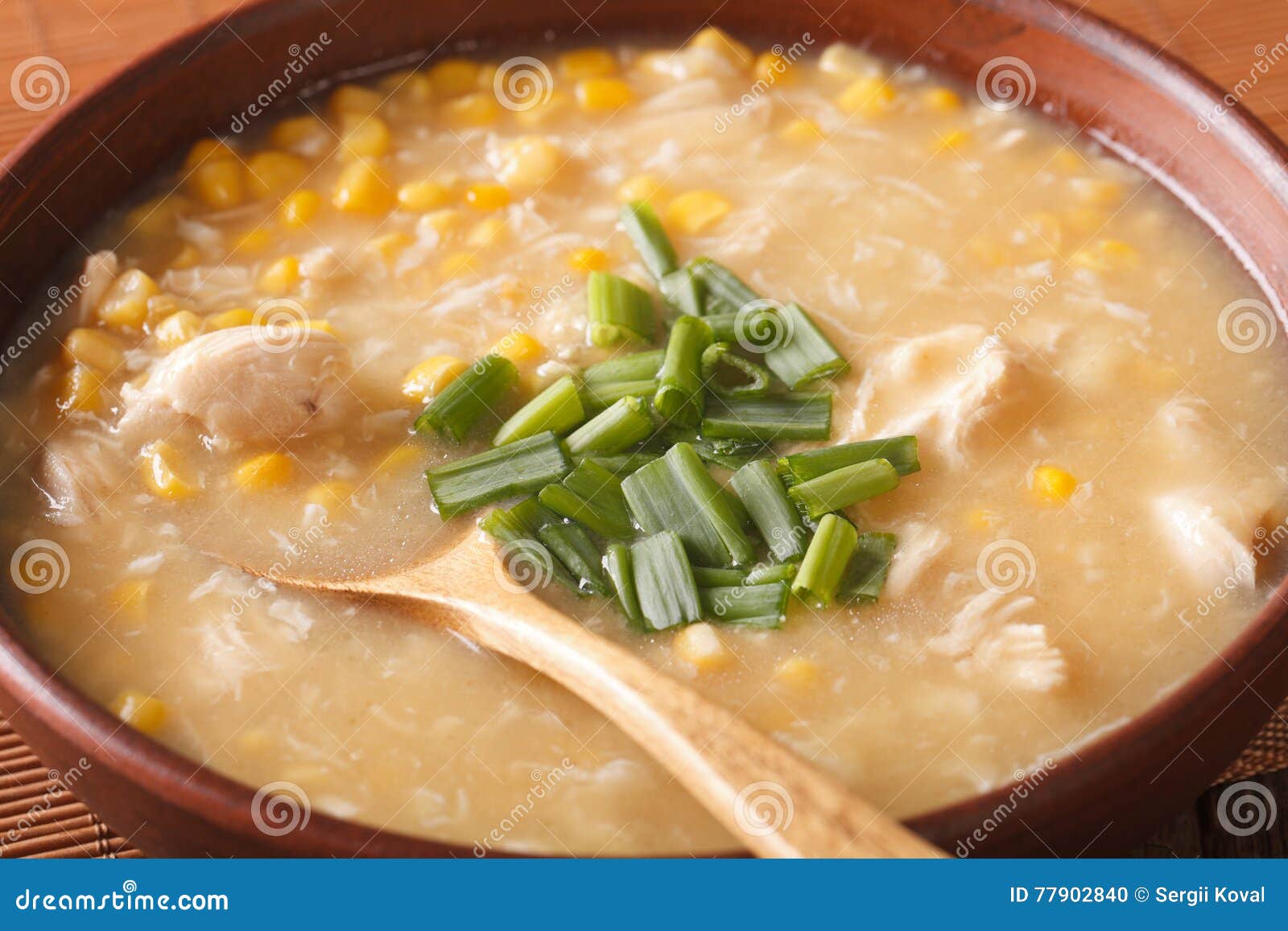 Chinese Thick Corn Soup with Chicken Close Up. Horizontal Stock Photo