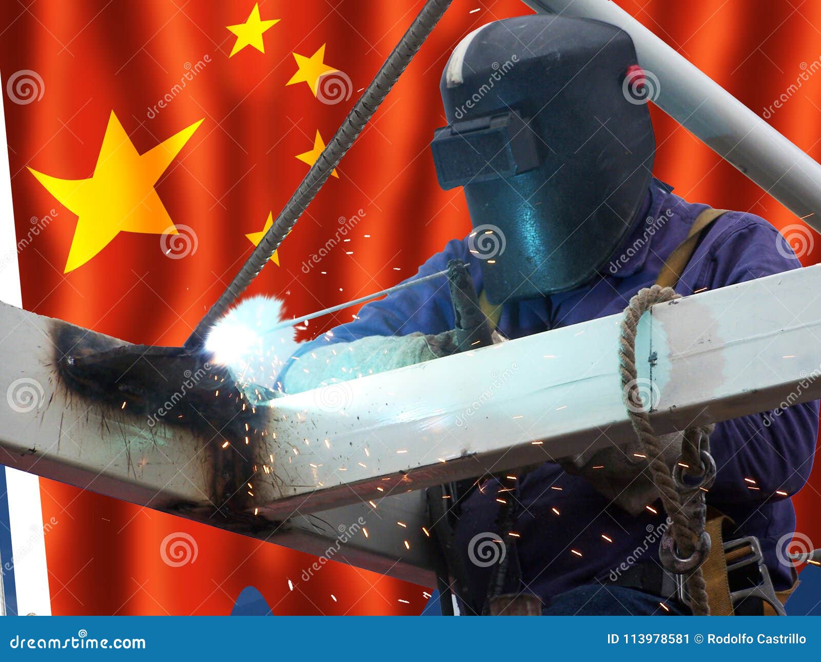 CHinese Welder with His Flag in the Background Stock Image Image of