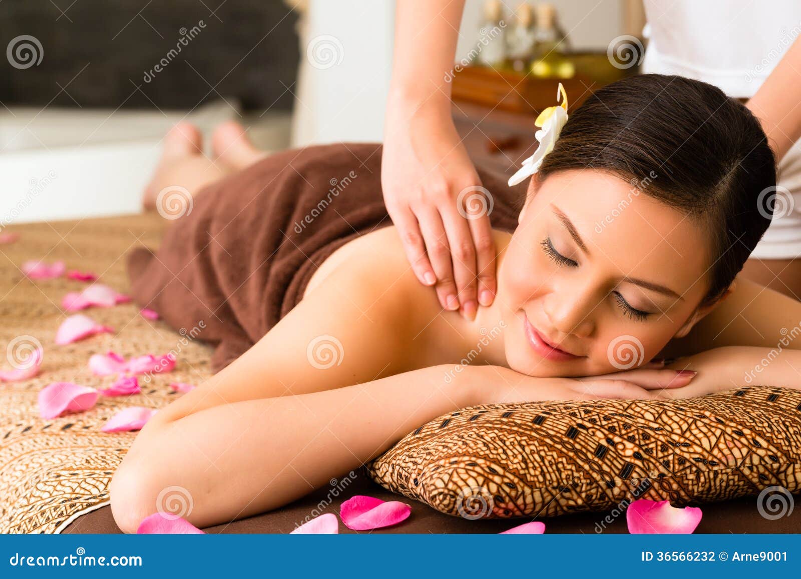 Chinese Woman At Wellness Massage With Essential Oils Stock Photo