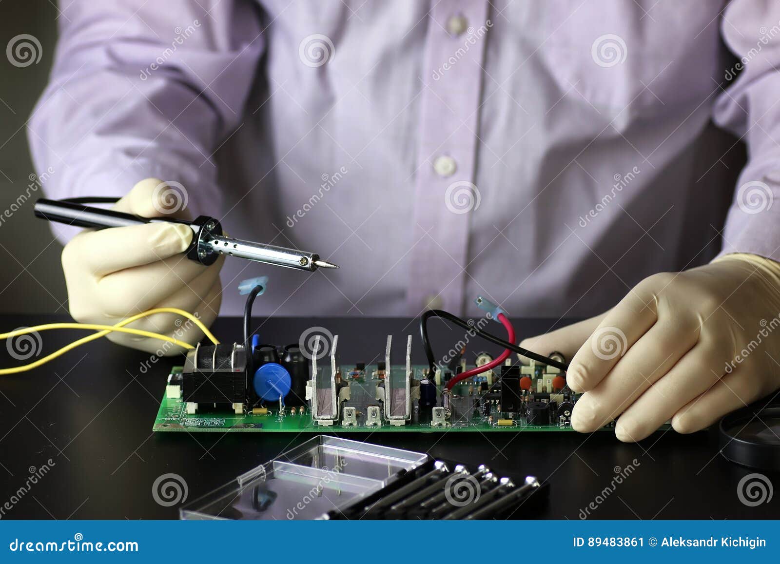 Chip soldering man hands stock image. Image of industrial 89483861