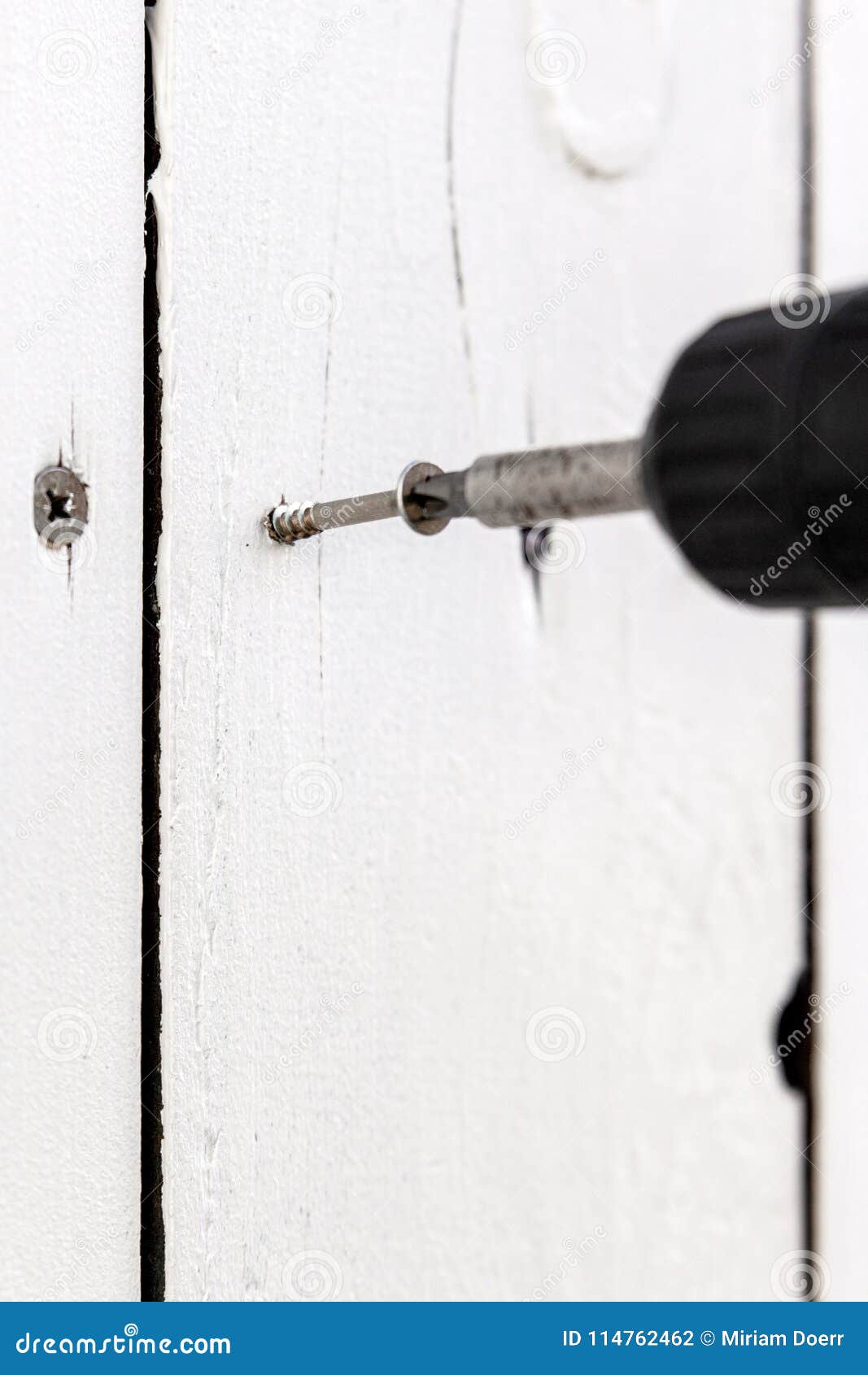 A Chipboard is Screwed into a Board Stock Photo Image of concept