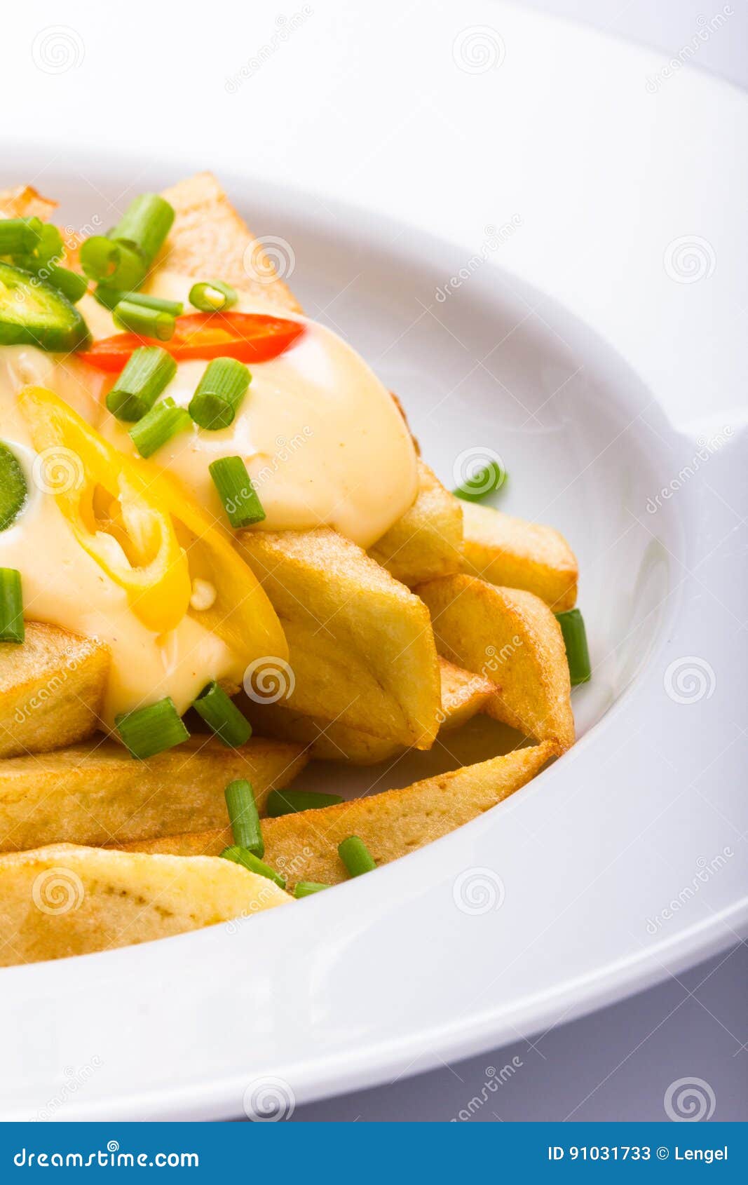 Chips with cheese sauce. stock image. Image of bright 91031733