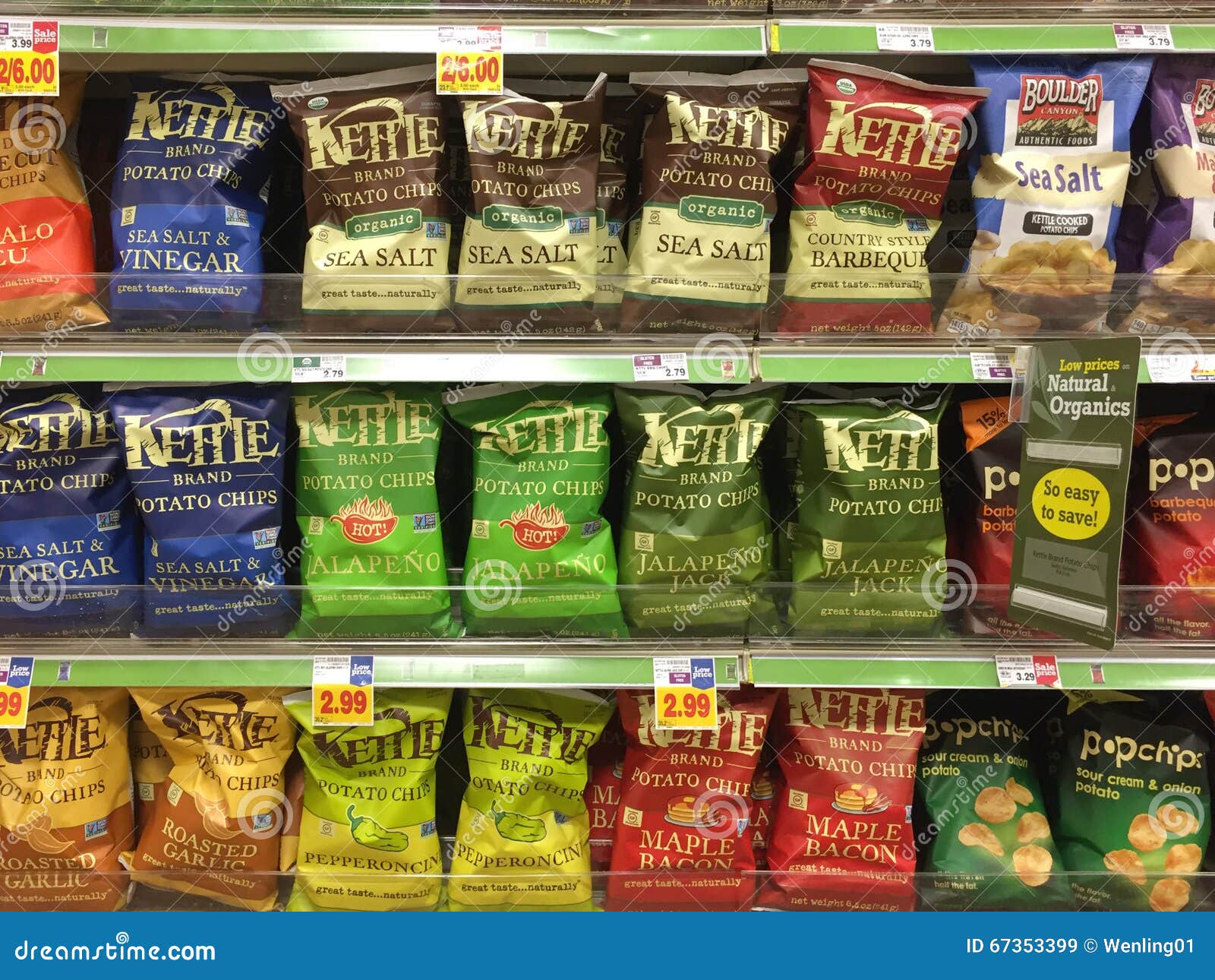 Chips on shelves selling editorial stock image. Image of supermarket