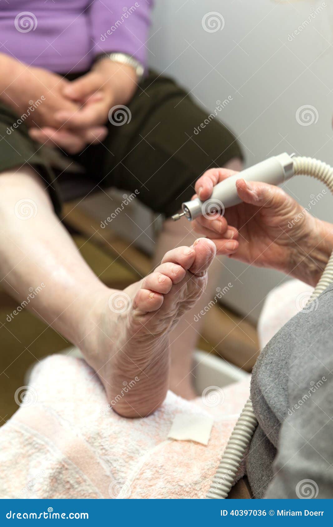 chiropody at a senior woman