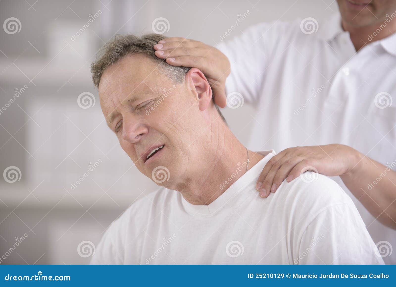 chiropractor doing neck adjustment