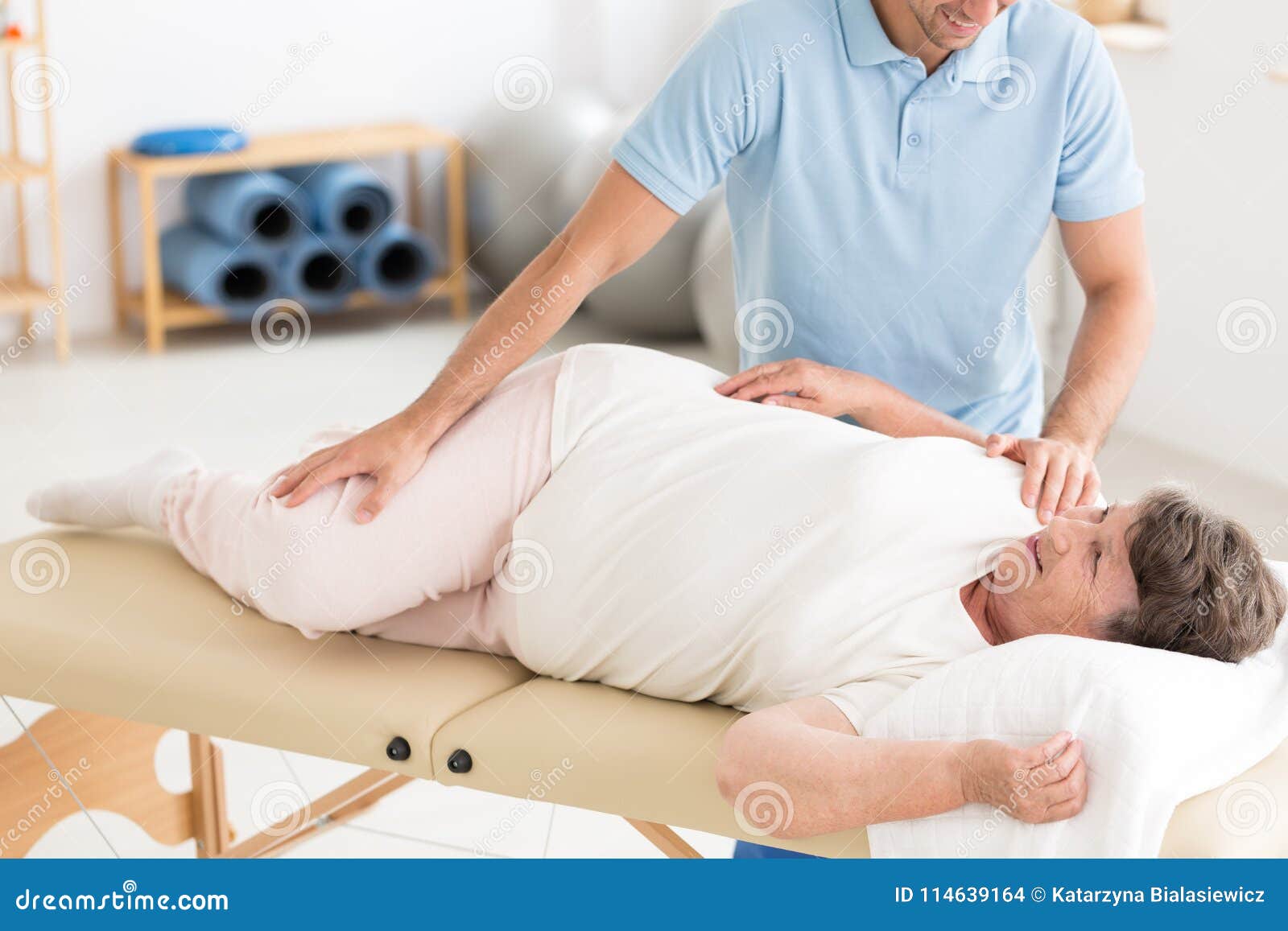 chiropractor performing back adjustment