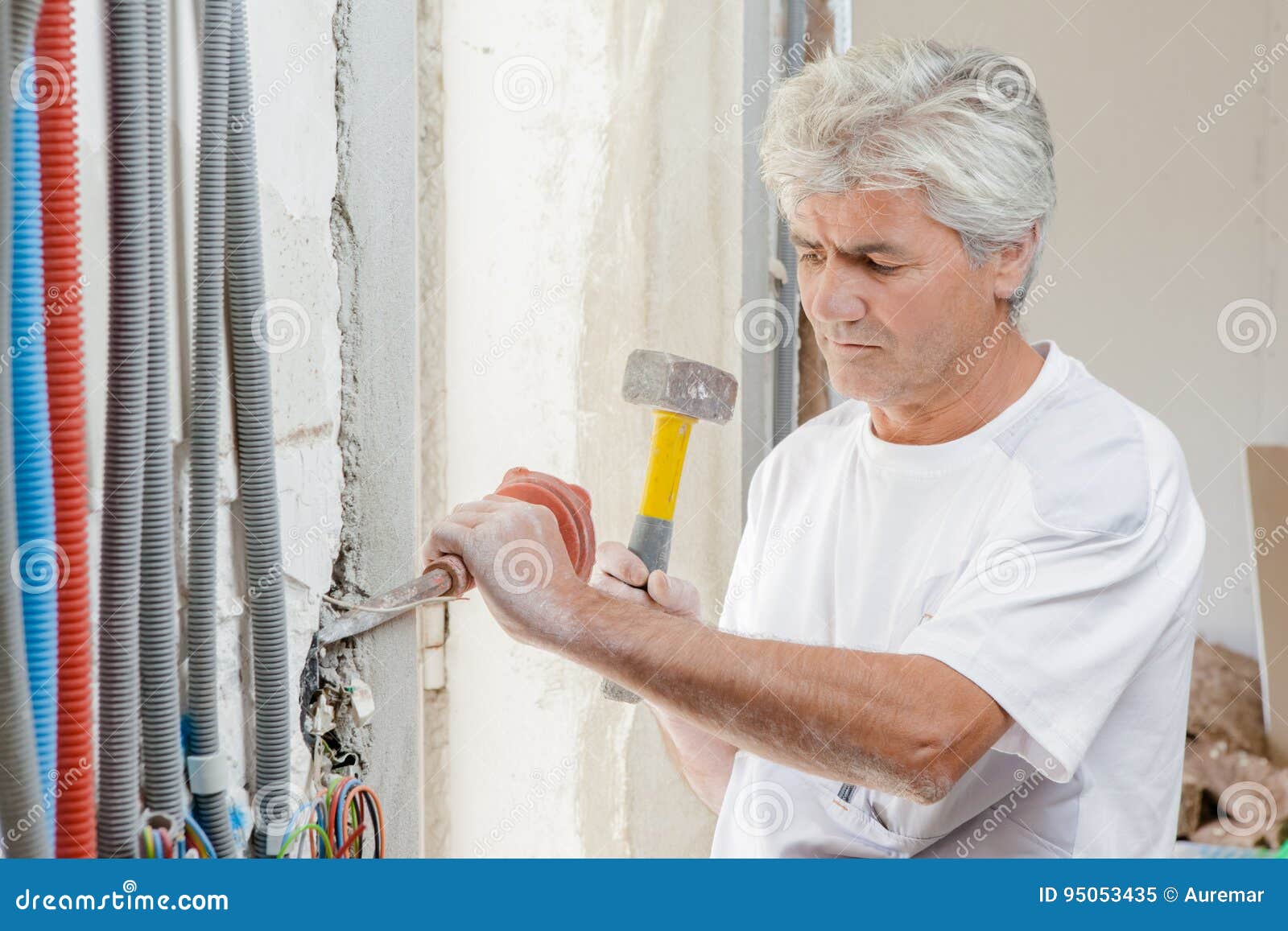 Chiseling away at wall stock image. Image of craft, chisel 95053435