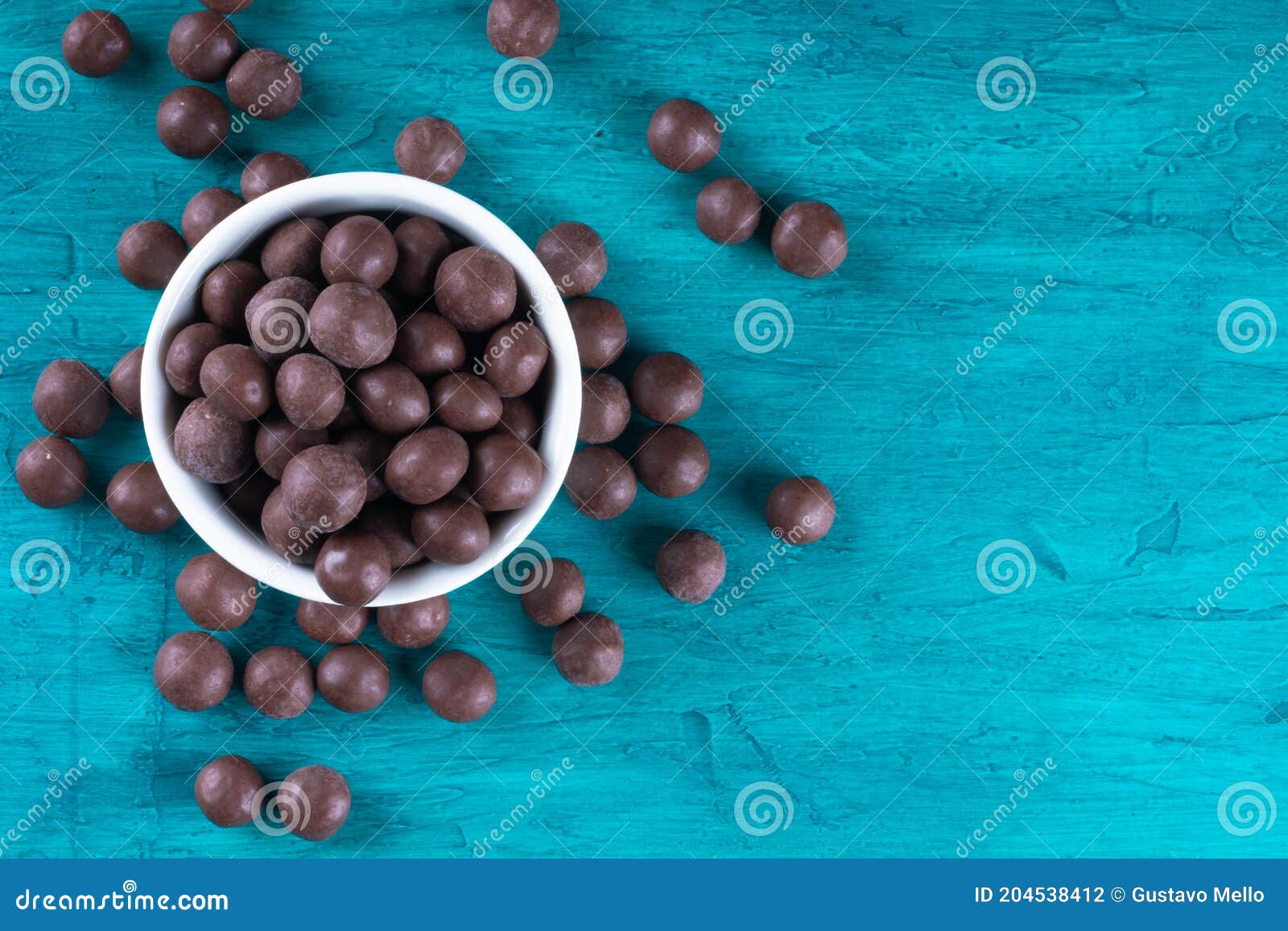 Chocolate Balls in White Bowl on Blue Background Stock Photo Image of