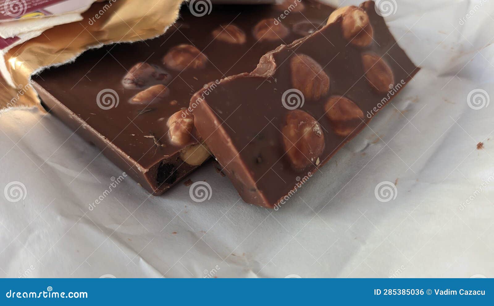 Chocolate Bar for Whole Hazelnuts in Foil Stock Photo Image of