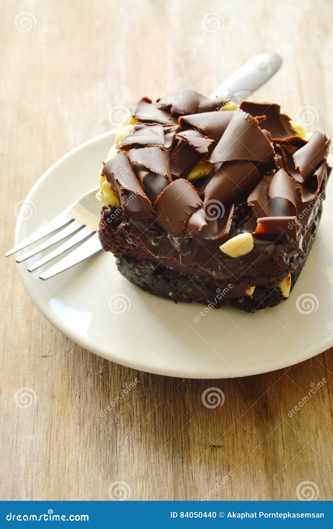 Chocolate Butter Cake Topping Slicing Chocolate and Fork on Dish Stock ...