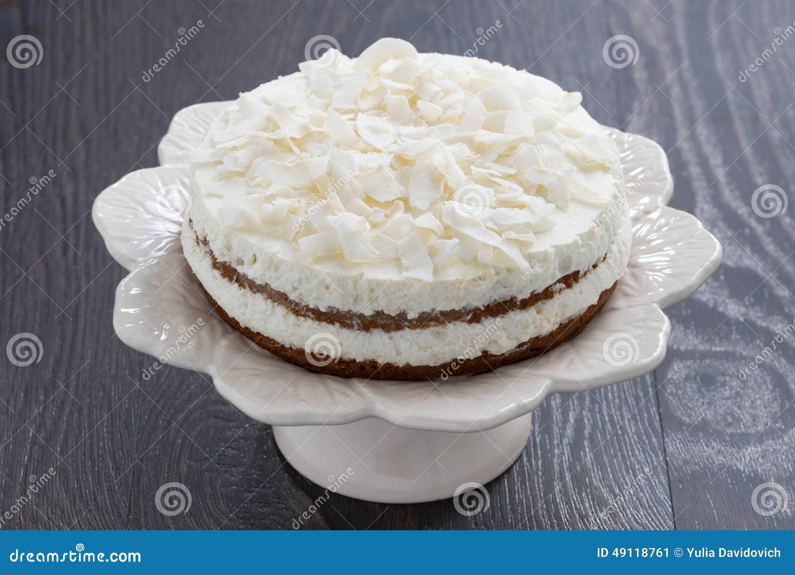 Chocolate Cake With Coconut Cream On A Dark Background Stock Image