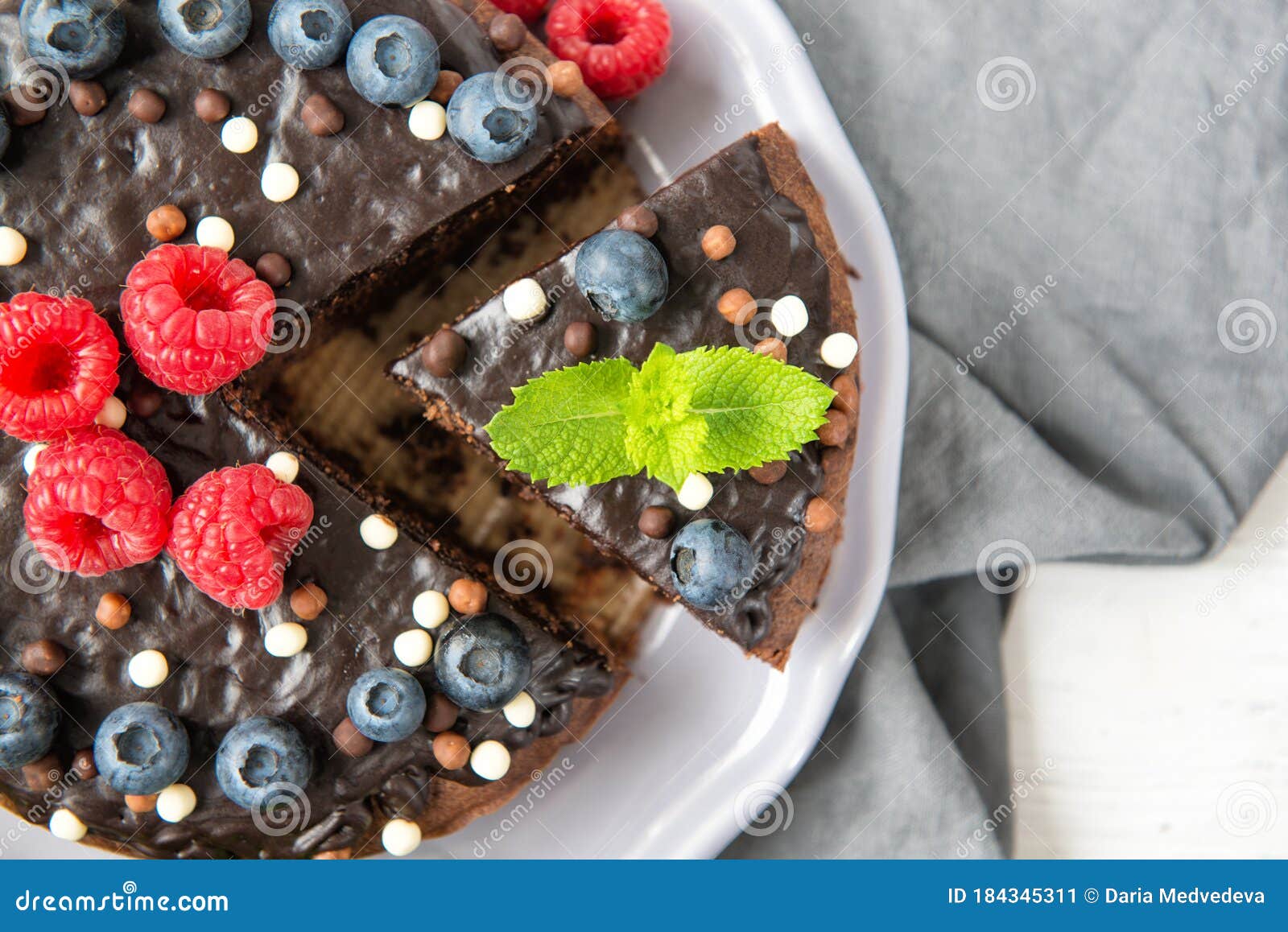 Chocolate Cake with Chocolate Icing, Raspberries, Blueberries and Mint