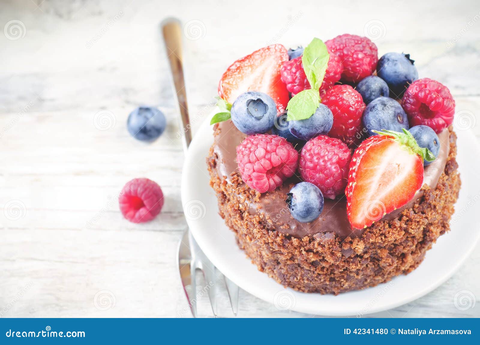 Chocolate Cake With Raspberries, Blueberries And Strawberries Stock ...