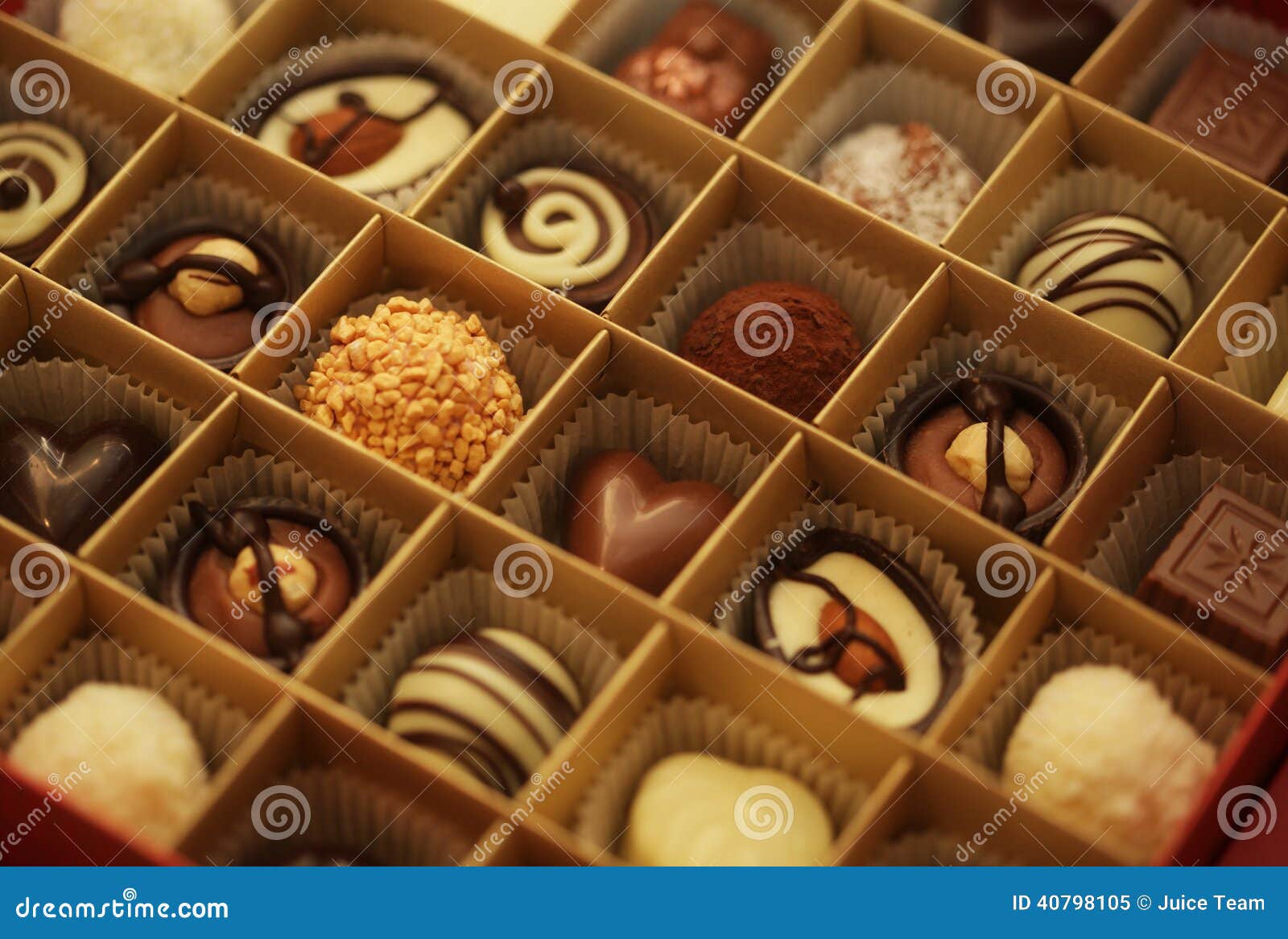 Chocolate candies in a box stock image. Image of milk 40798105