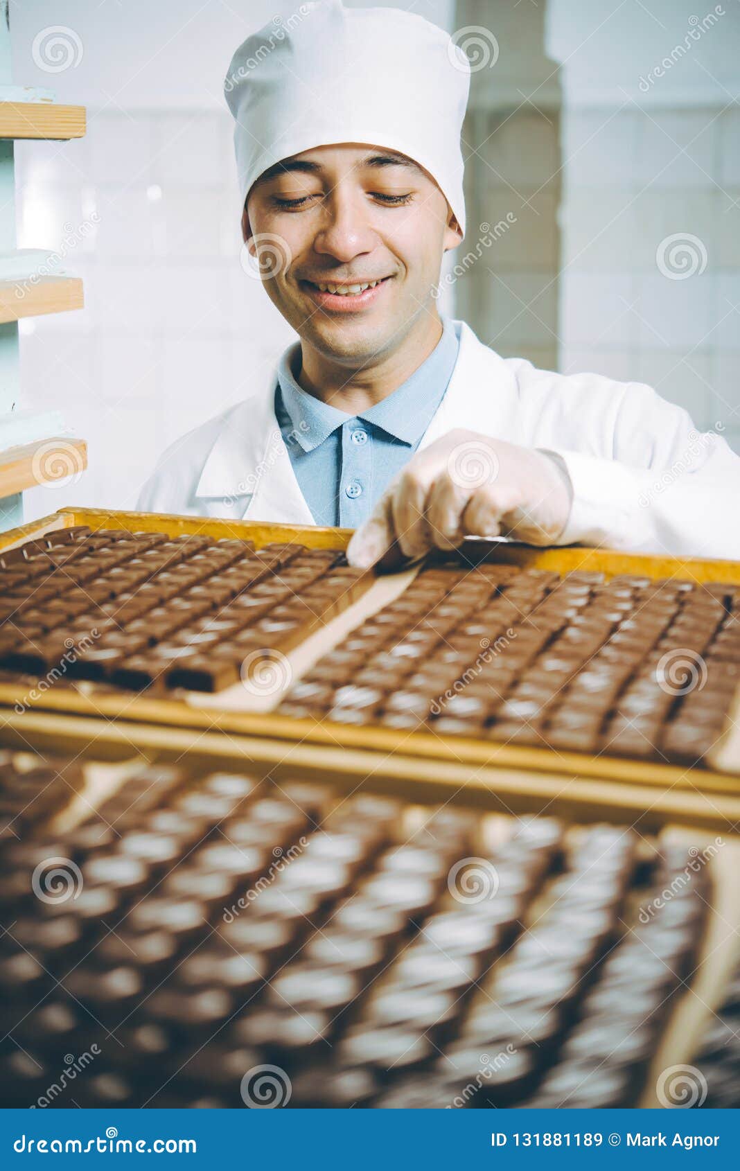 Chocolate candy making stock image. Image of positive 131881189