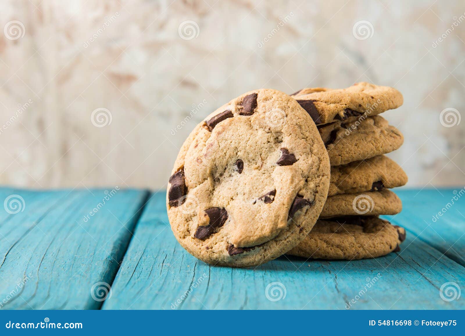 chocolate chip cookies on blue table