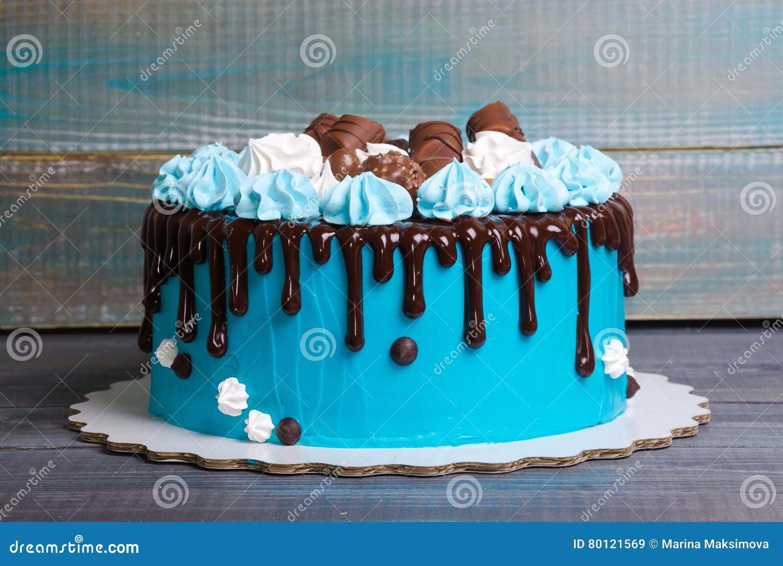 Chocolate Color Drip Cream Cheese Cake with Merengues Stock Image