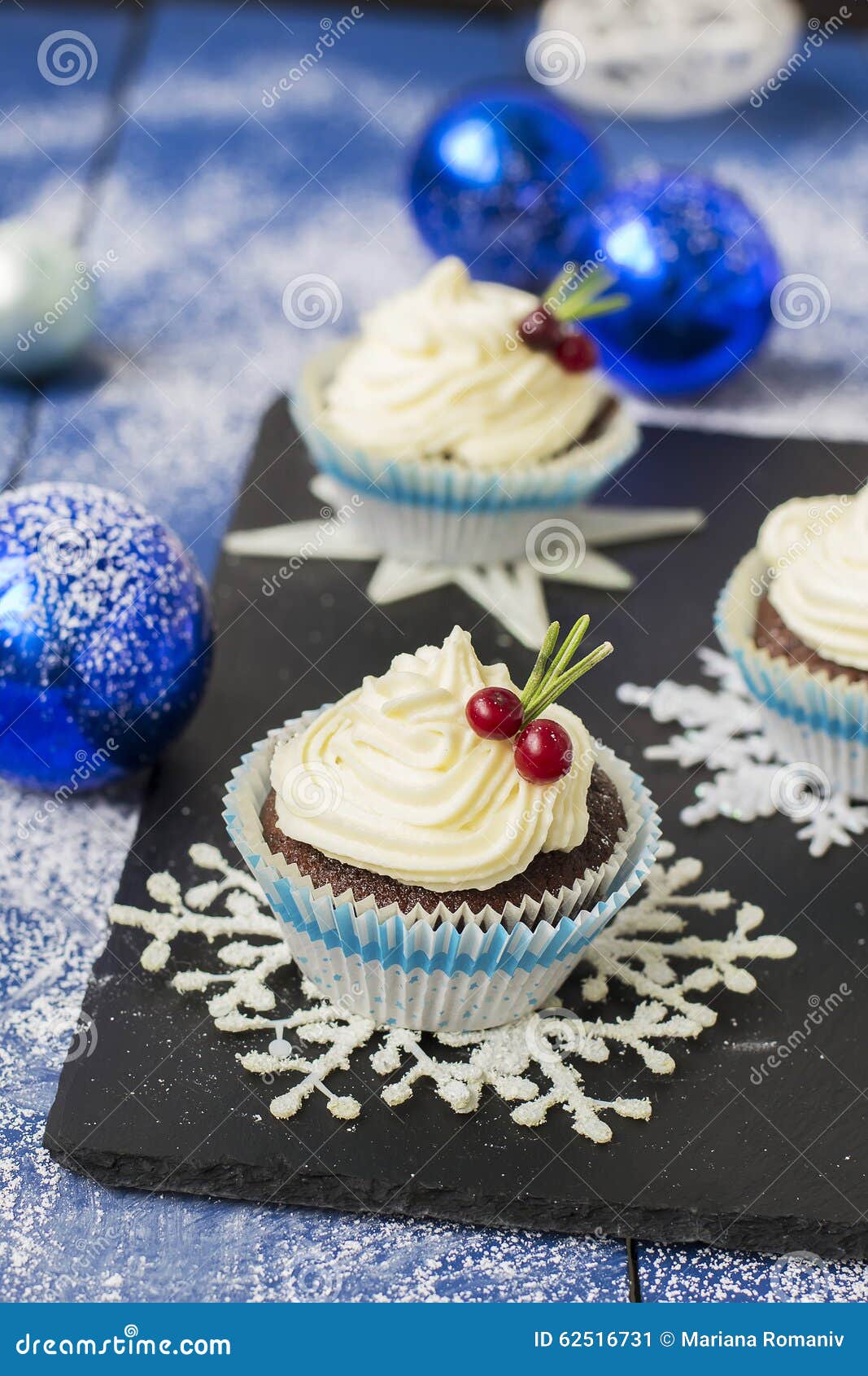 Chocolate Cupcake with Cream Cheese in Christmas Decorations Stock